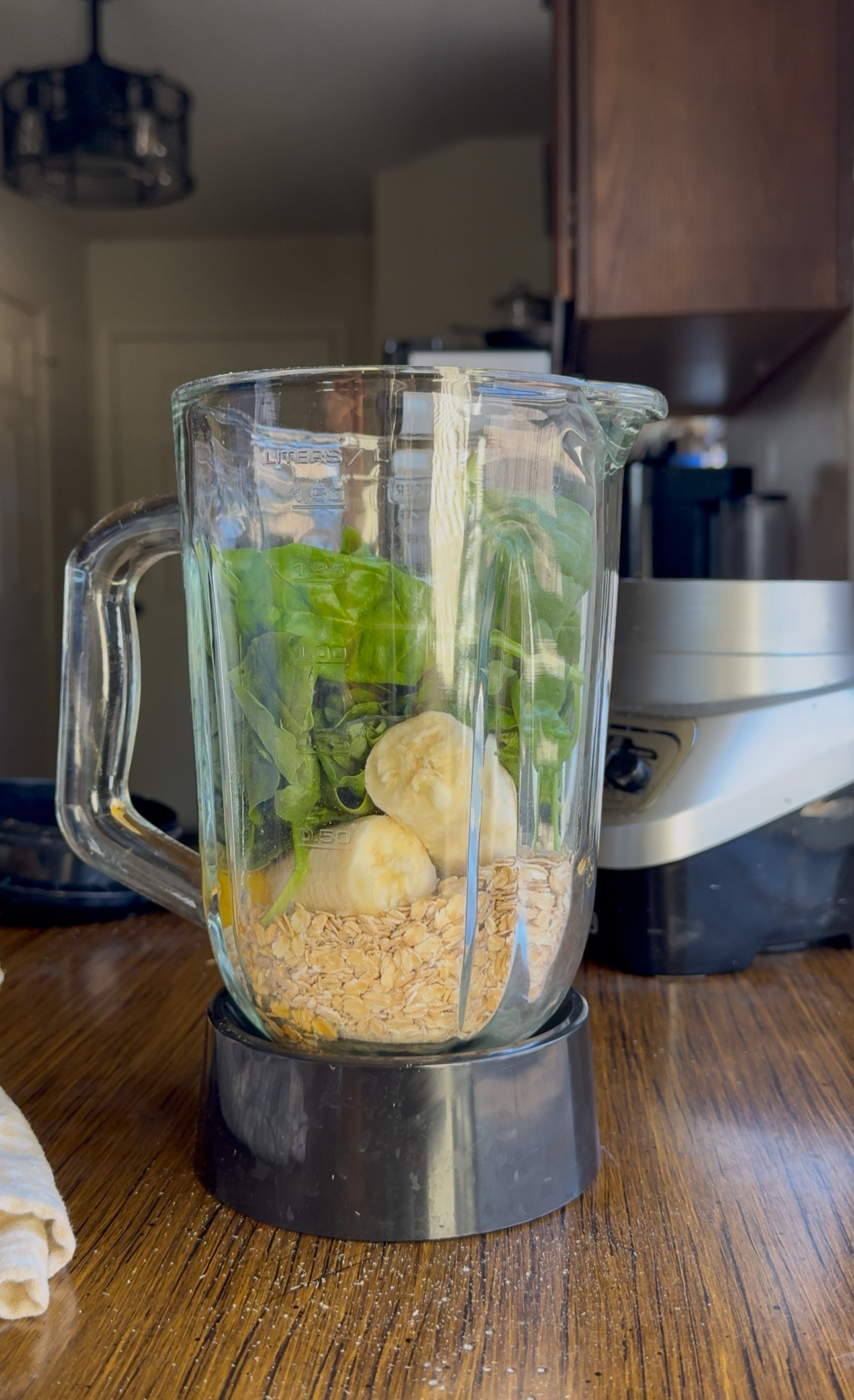 spinach, oats or almond flour, banana, eggs, yogurt (if using), vanilla, baking powder in the blender