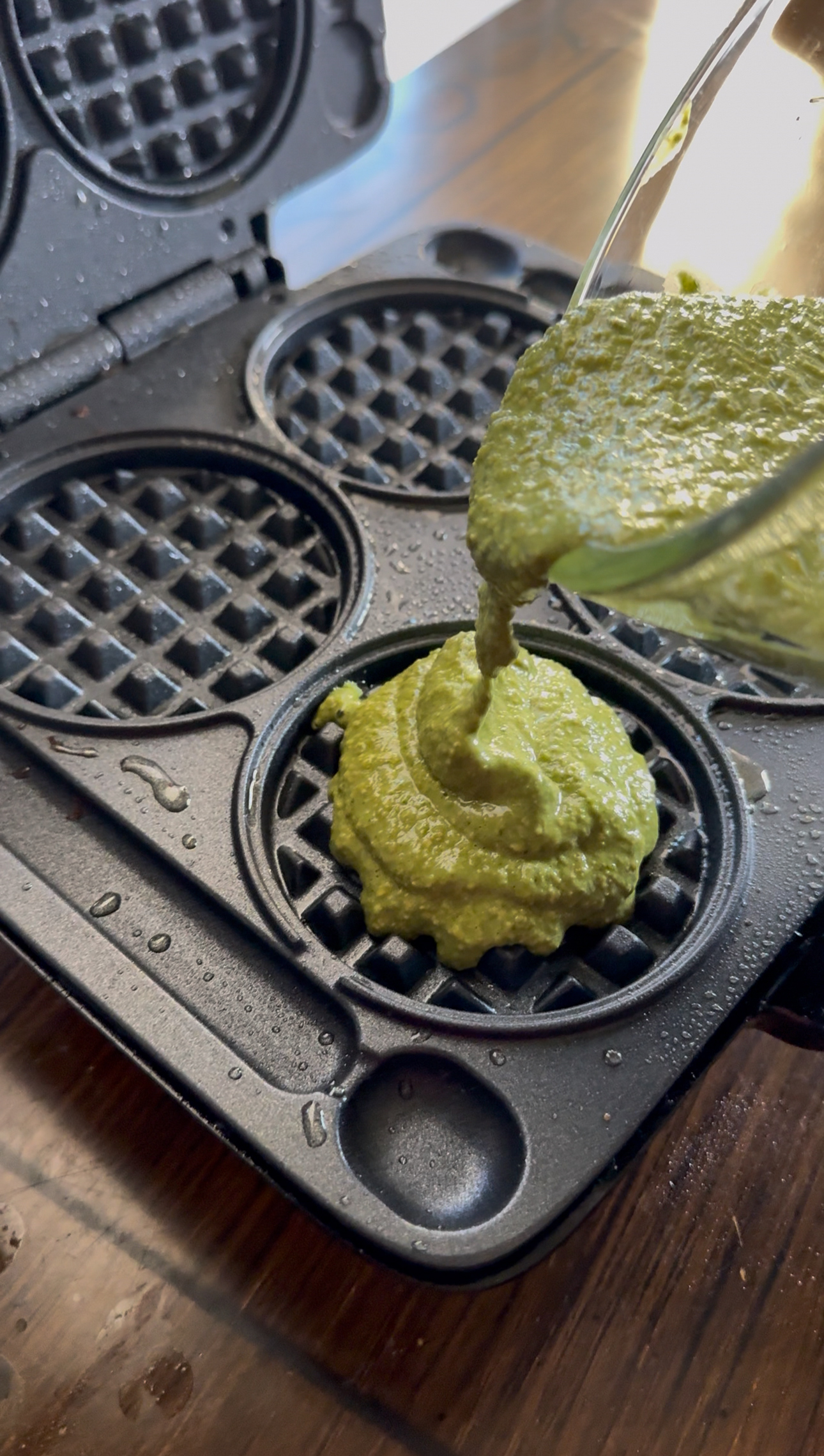 pouring batter into iron