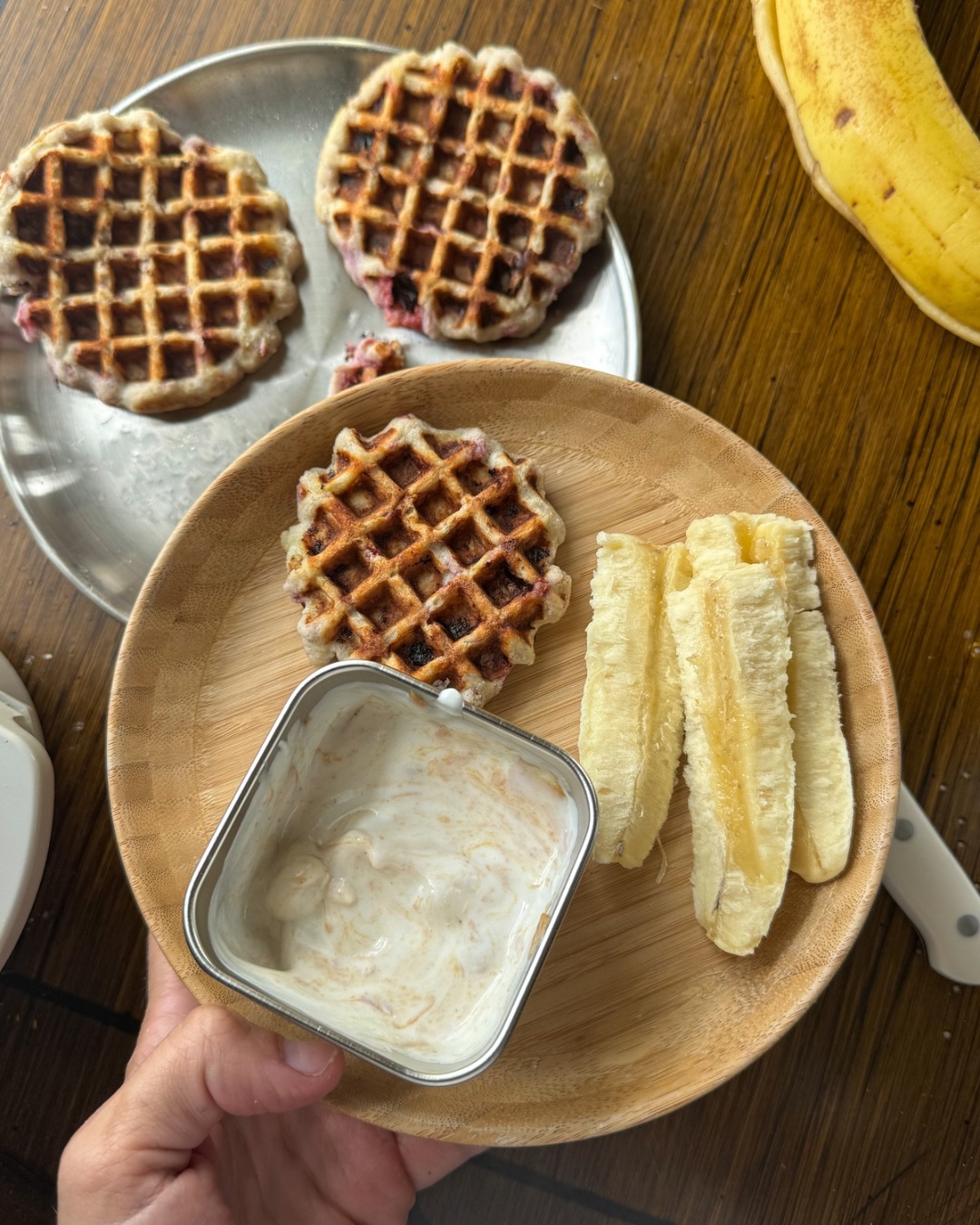 serving waffle to toddler
