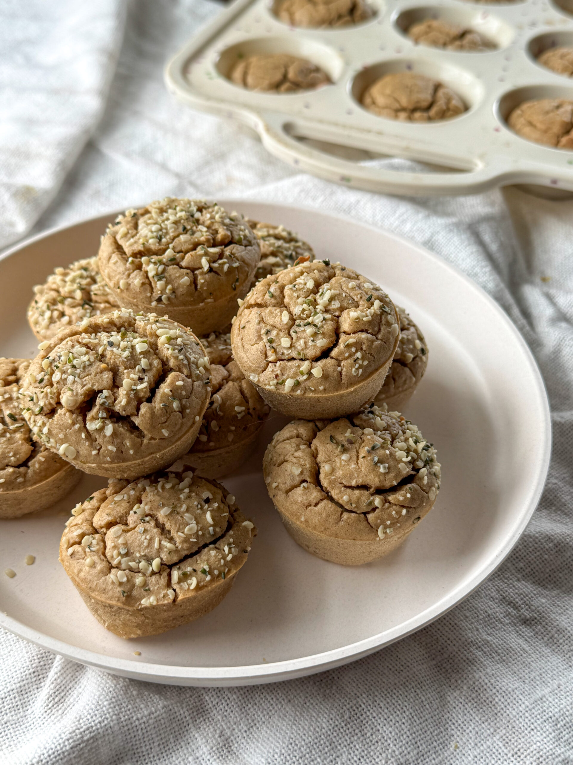 simple banana chickpea muffins on a plate for toddlers and babies