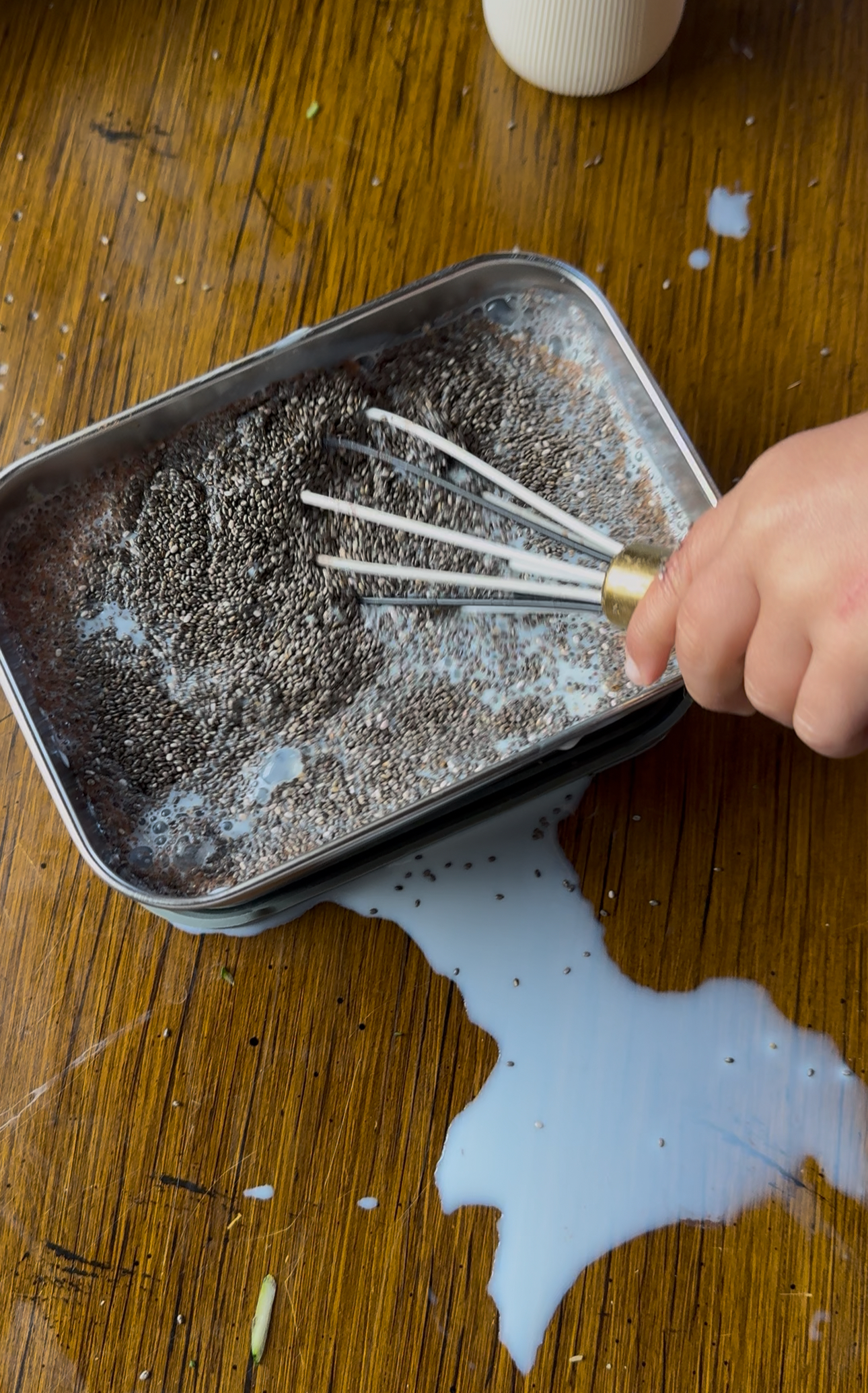 mixing the ingredients to chia pudding well