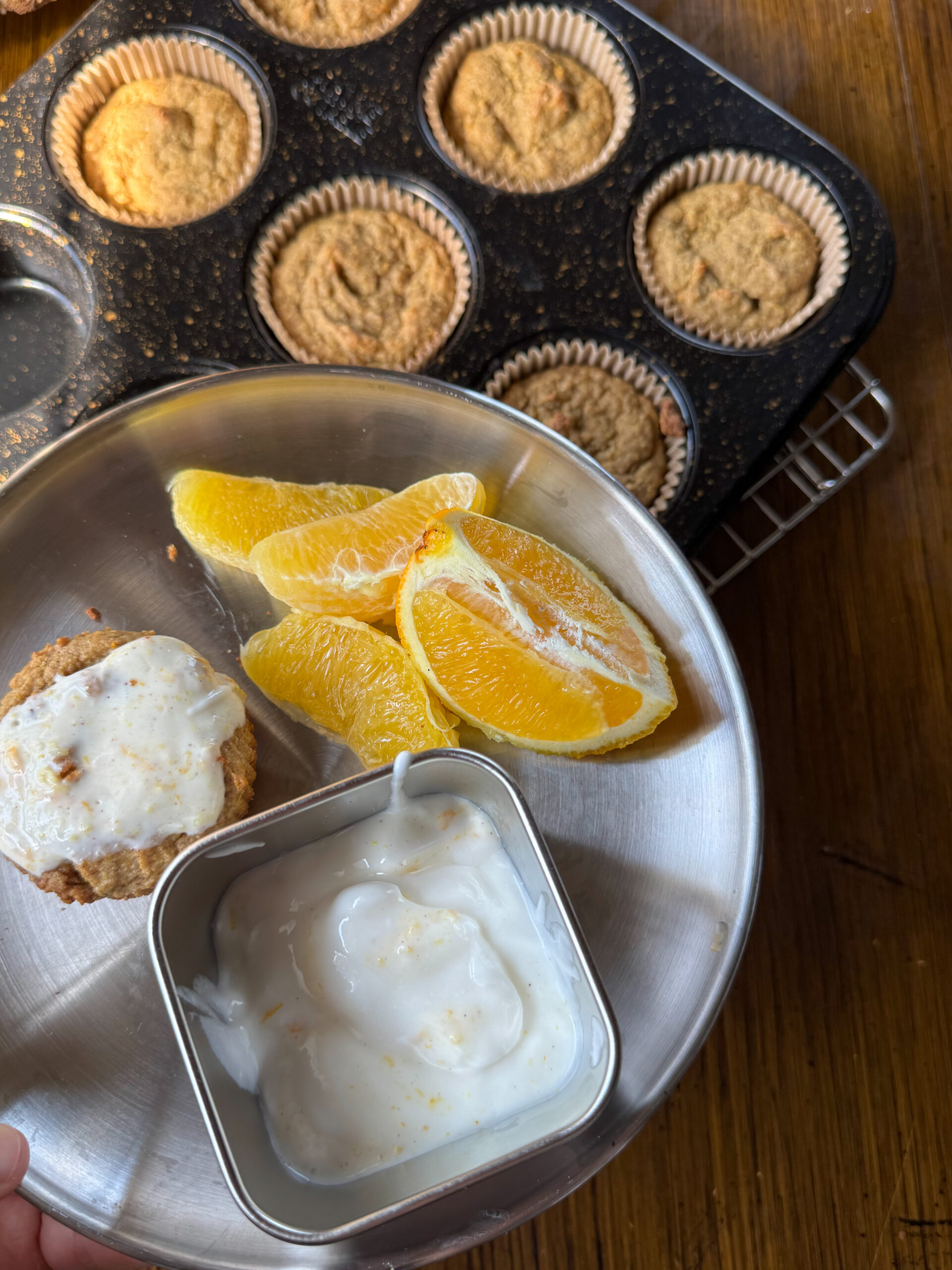 simple orange oatmeal muffins glazed with yogurt icing