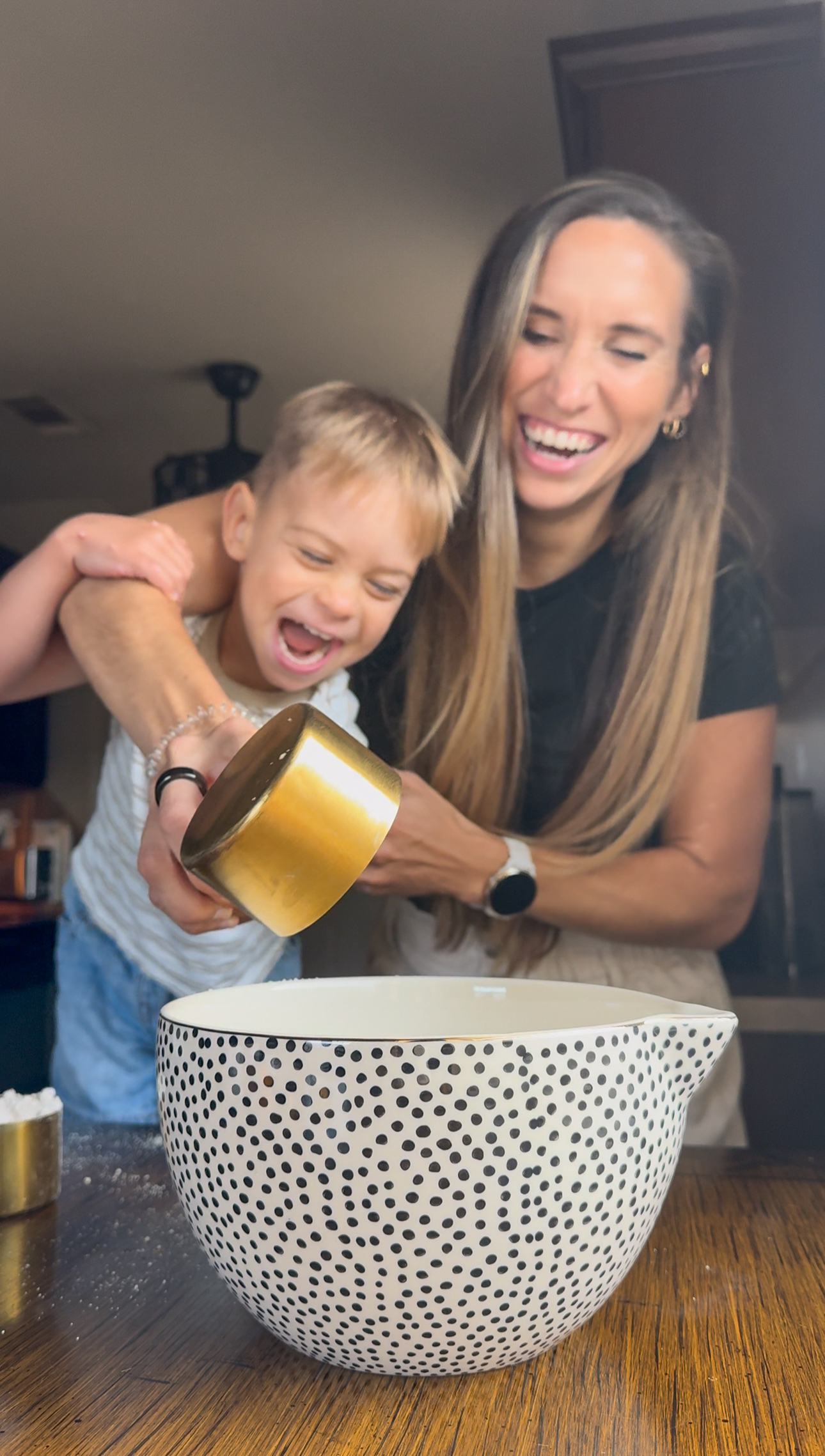 dietitian mom and toddler mixing the ingredients for breakfast