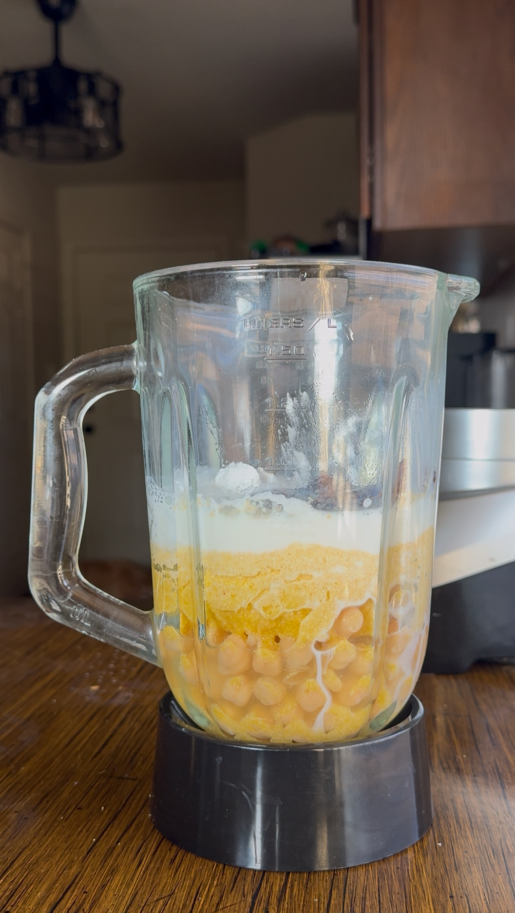 adding ingredients into the blender