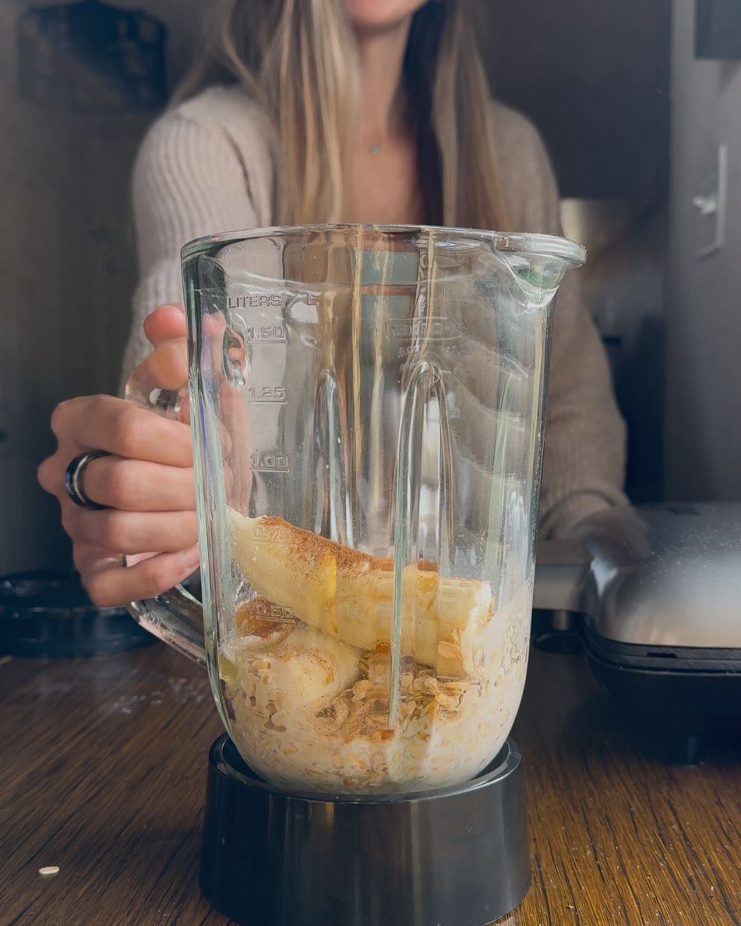 pouring ingredients into the blender