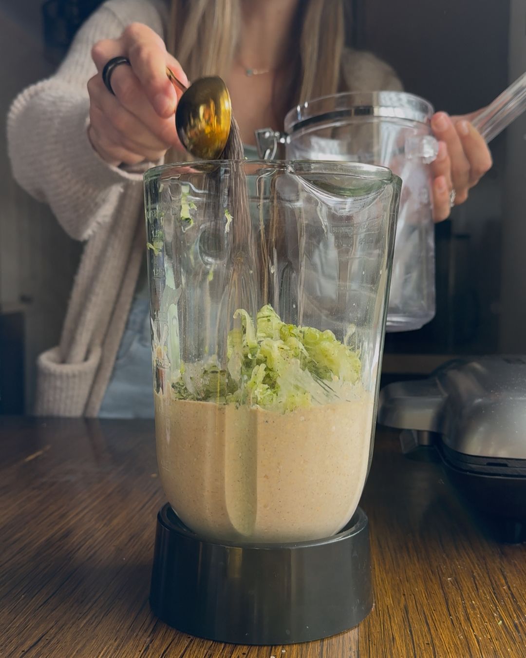 stirring zucchini and chia seeds in