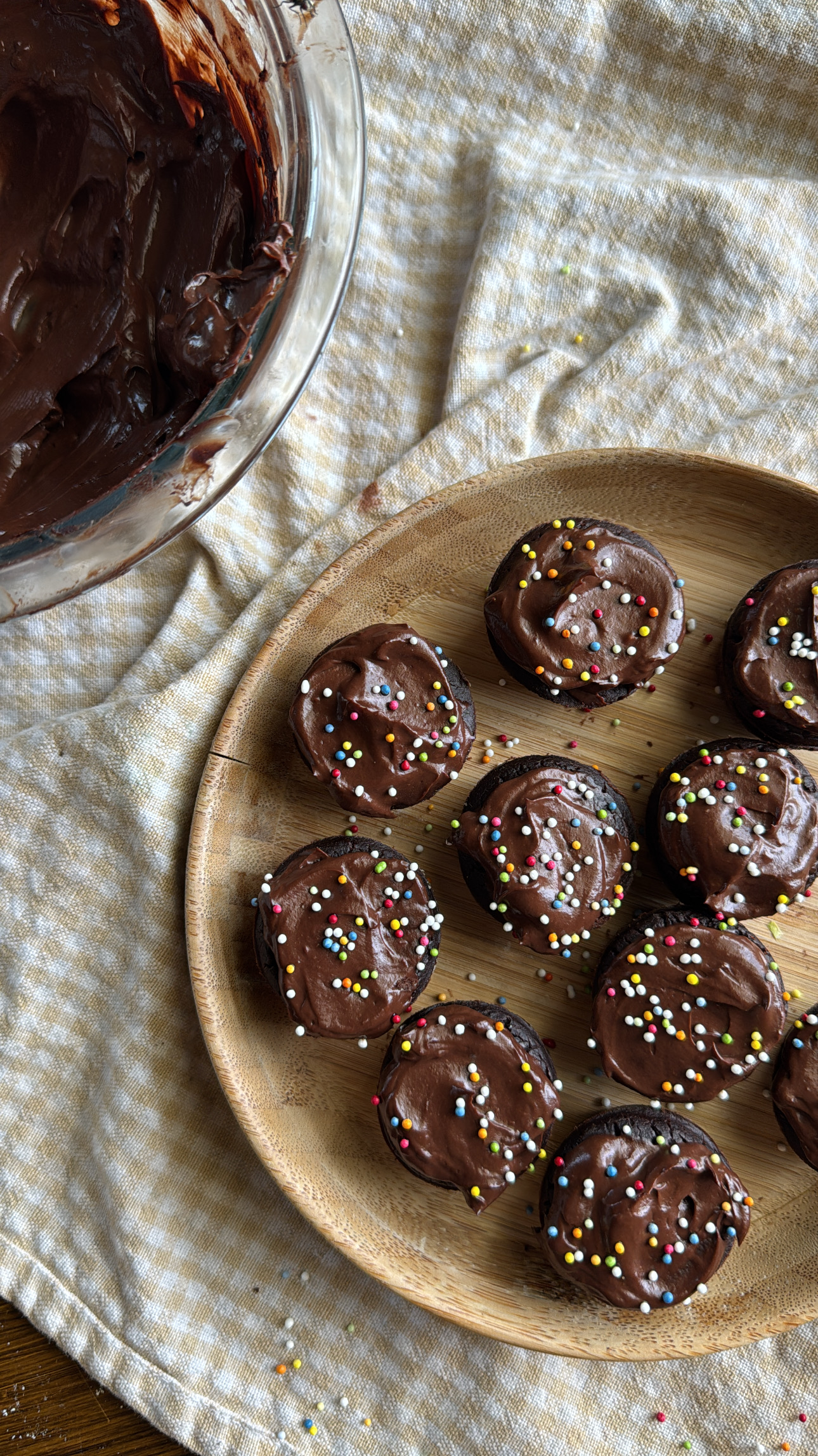 chocolate avocado frosting spread on black bean brownie bites