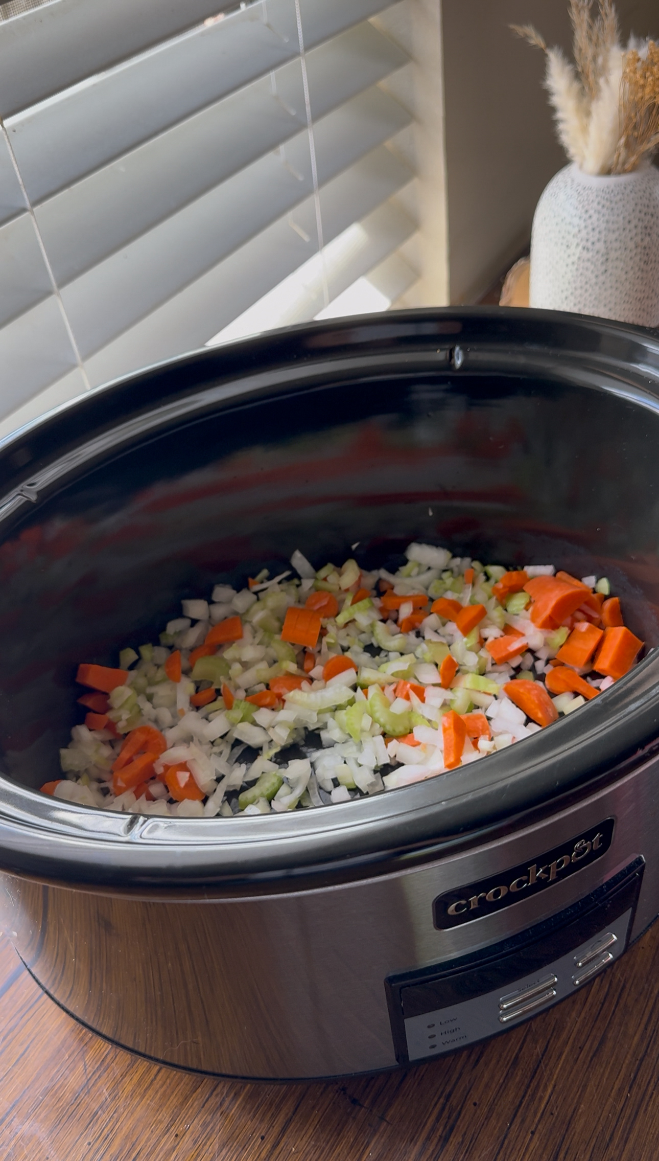 cut carrots, celery, and onion in crock pot