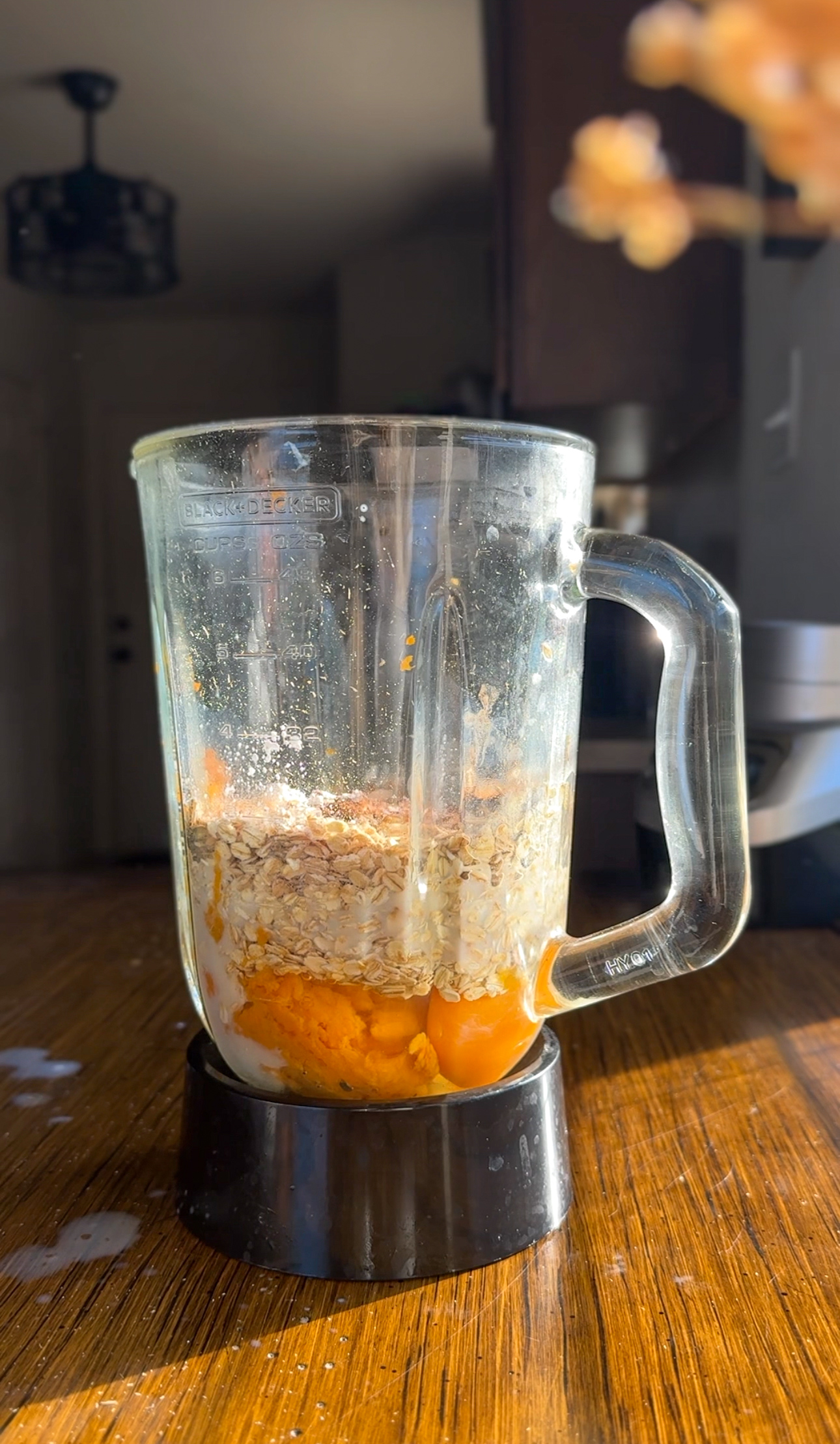 adding the sweet potato pancake ingredients into the blender