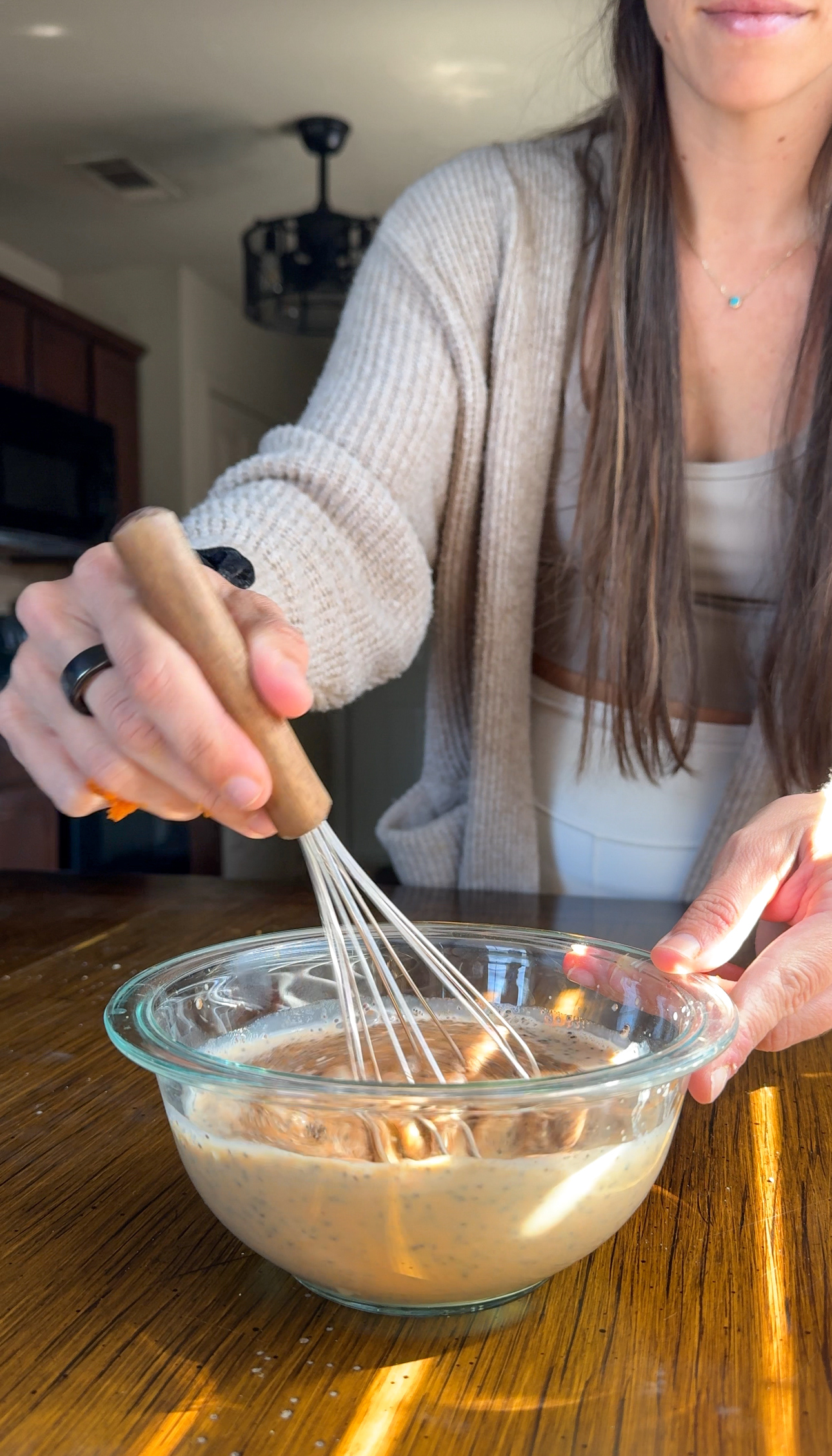 whisking ingredients together