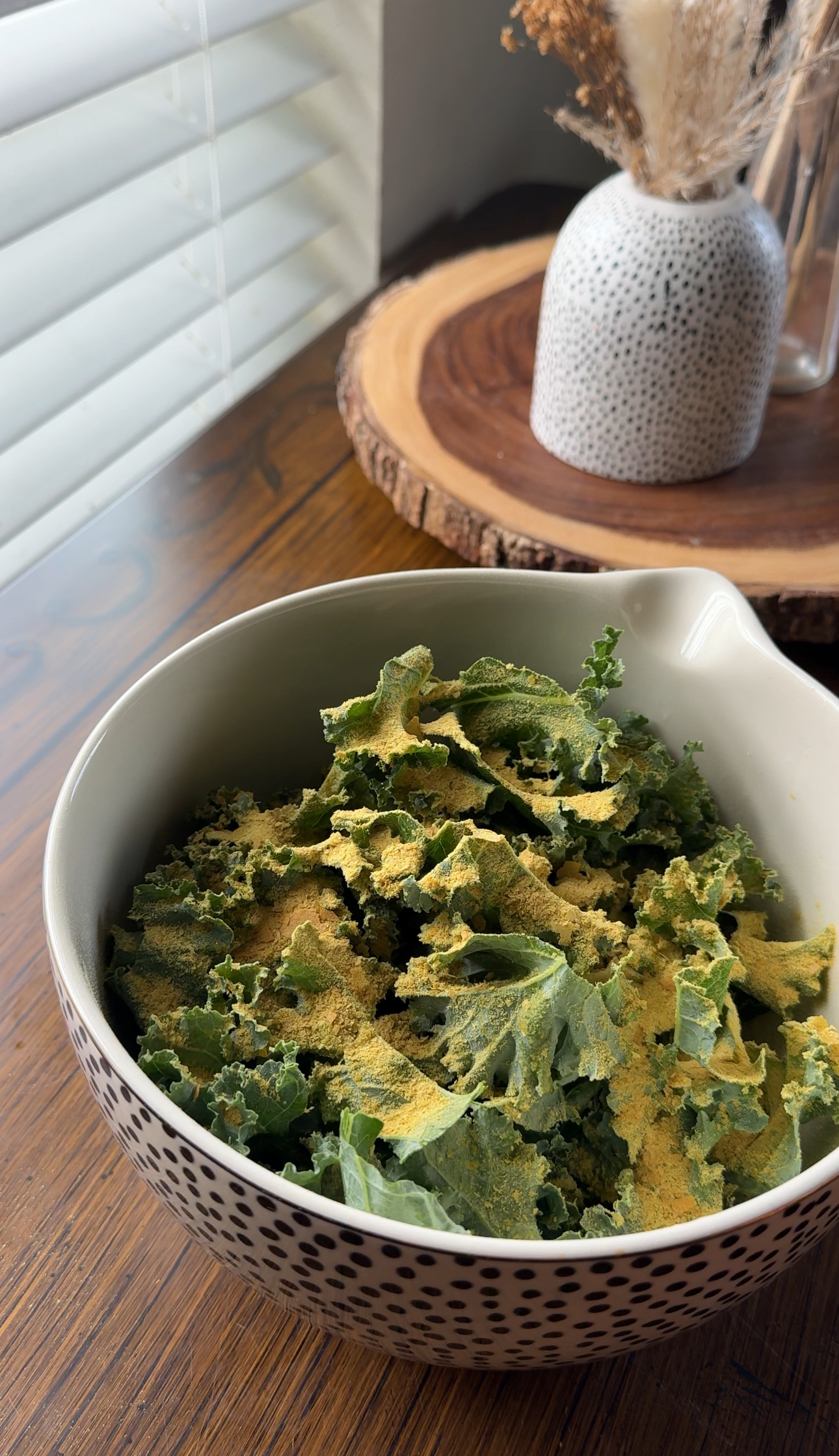 massaging kale with oil and nutritional yeast
