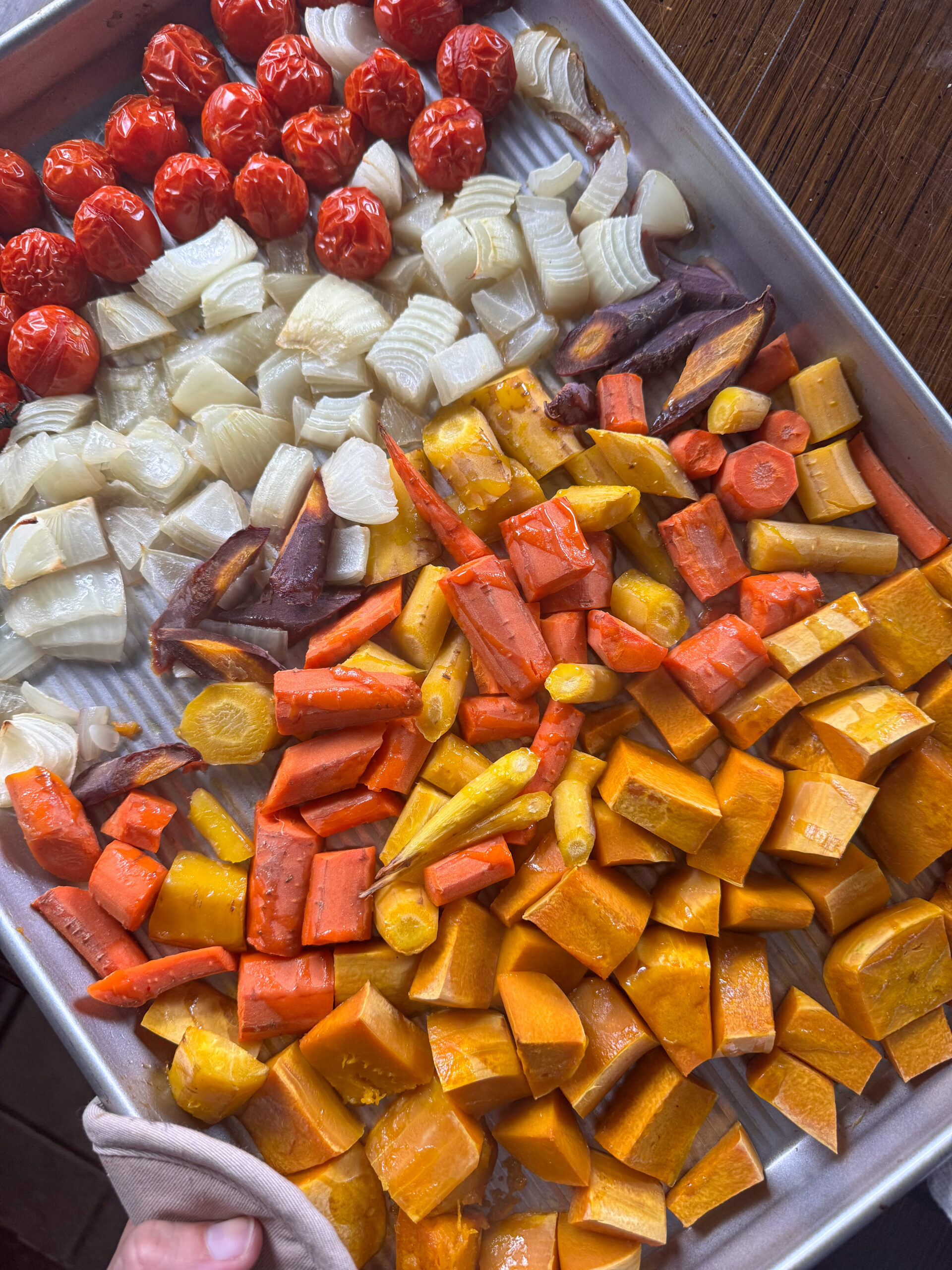 butternut squash, tomatoes, onion, carrots on a sheet pan