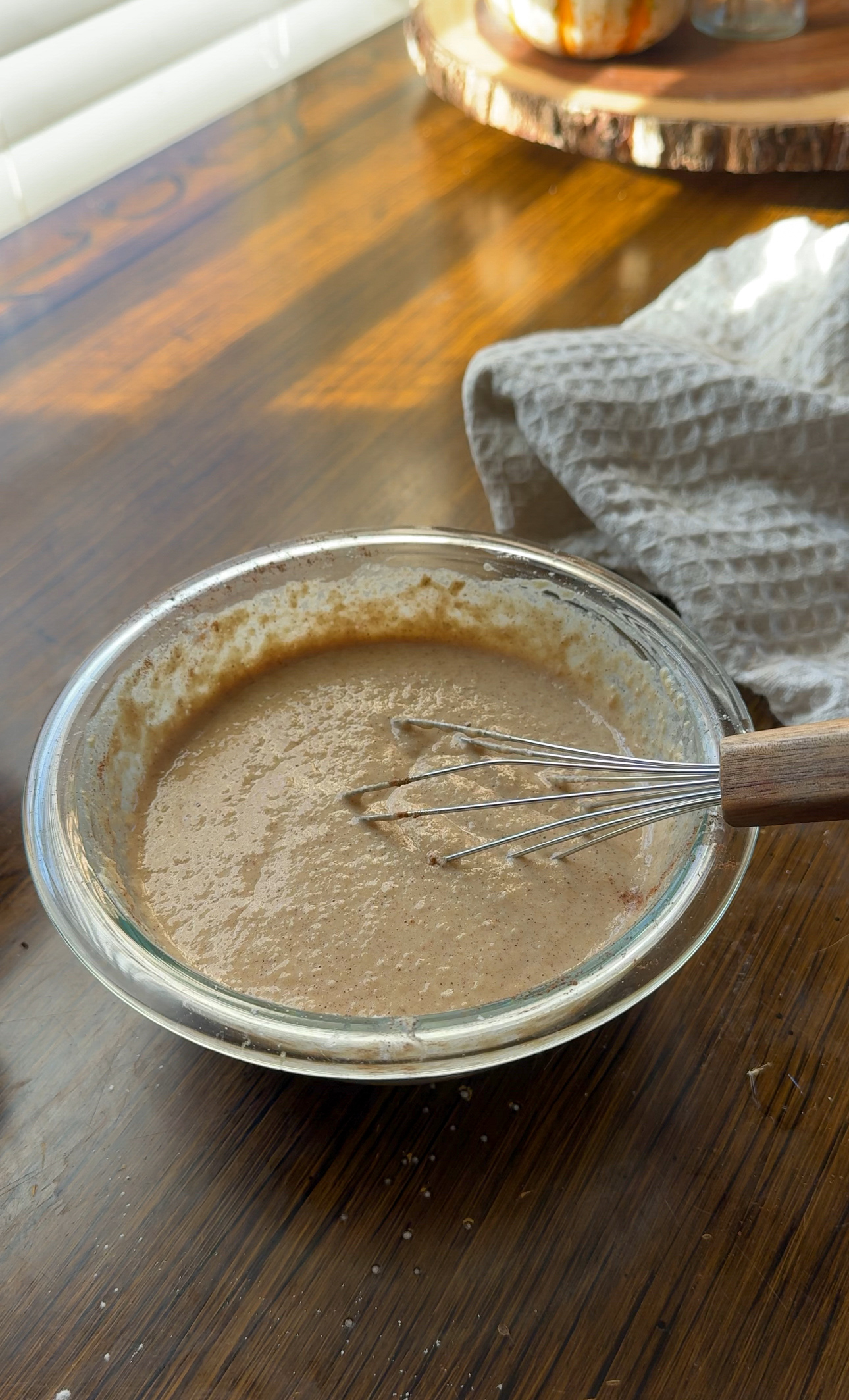 oat flour, applesauce, eggs, and cinnamon mixed together for waffle batter