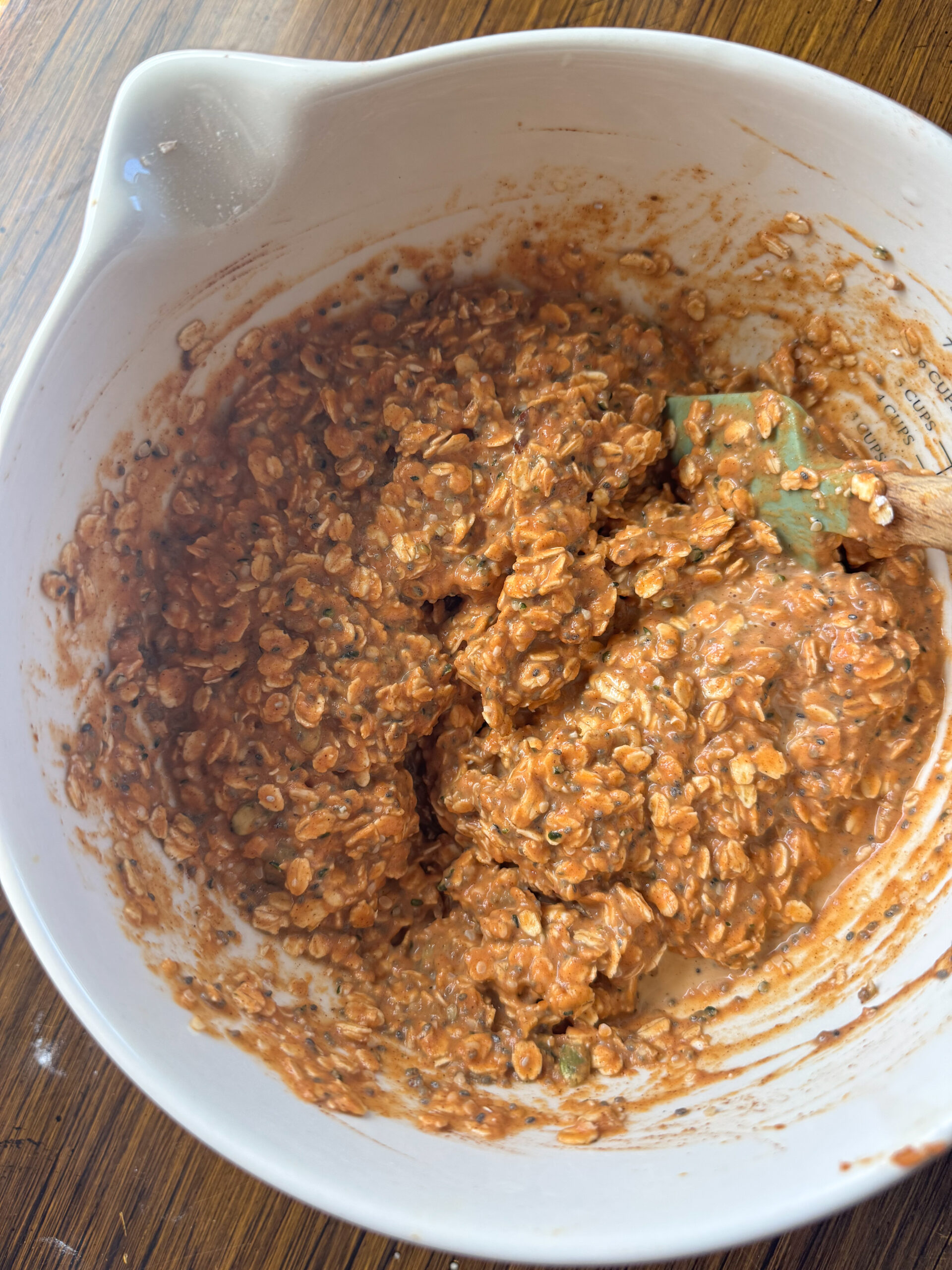 mixing the oat bar mixture together