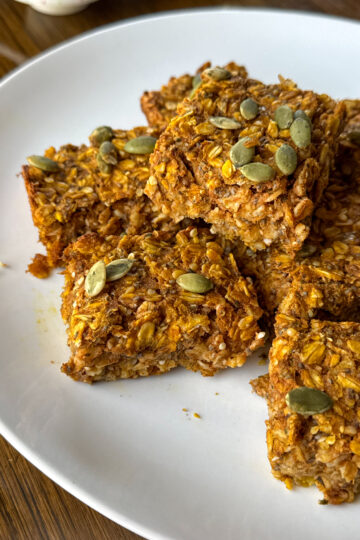 pumpkin oatmeal bars on a white plate