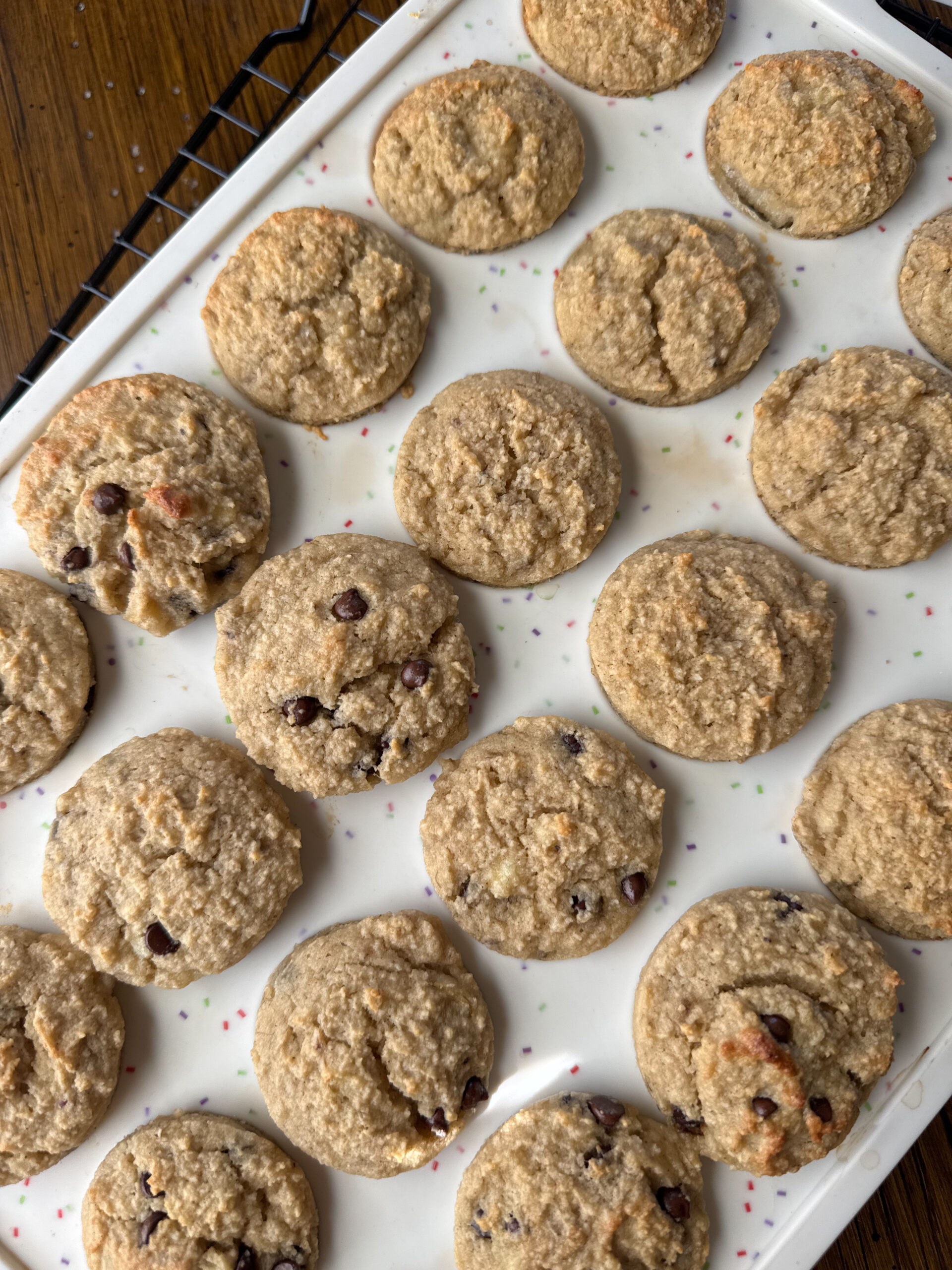 mini almond flour banana muffins cooling on a rack