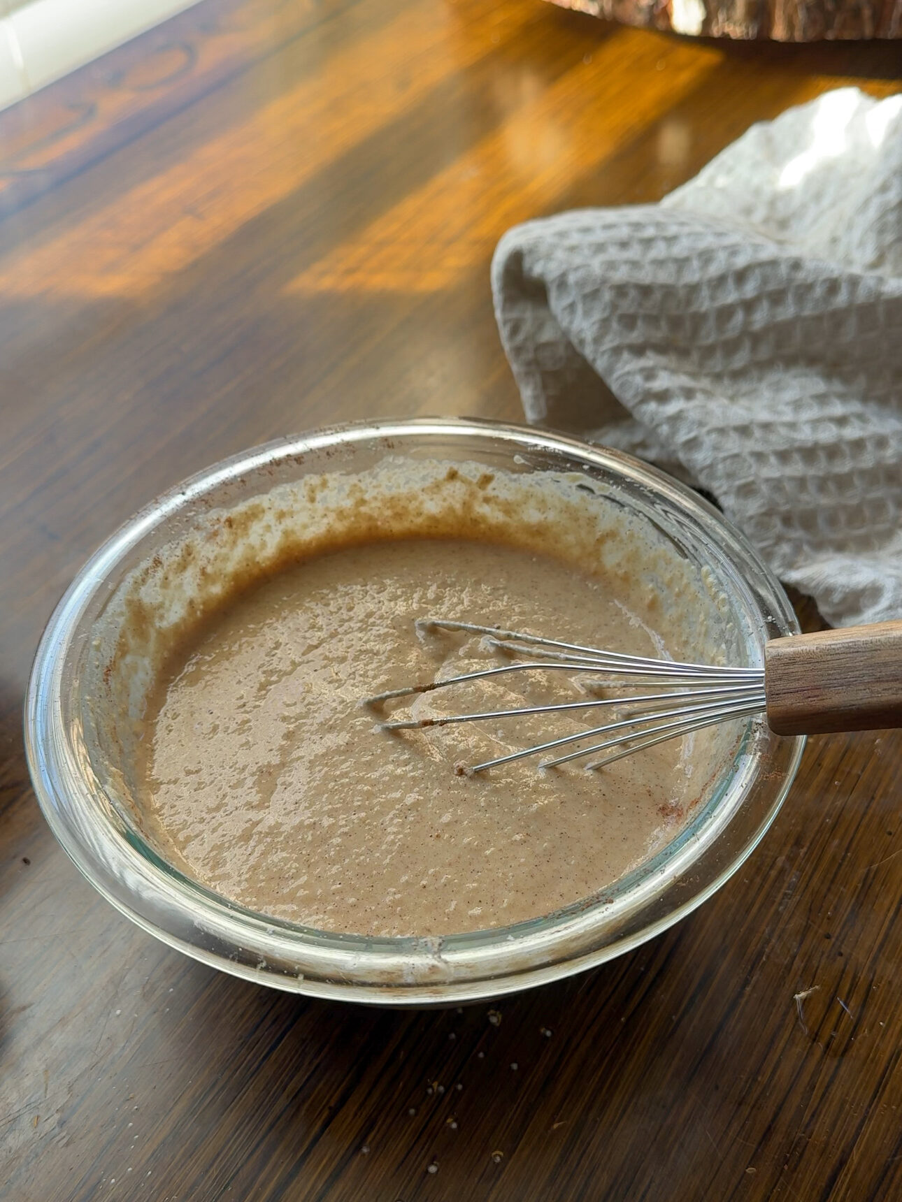 oat flour, applesauce, eggs, and cinnamon mixed together for waffle batter