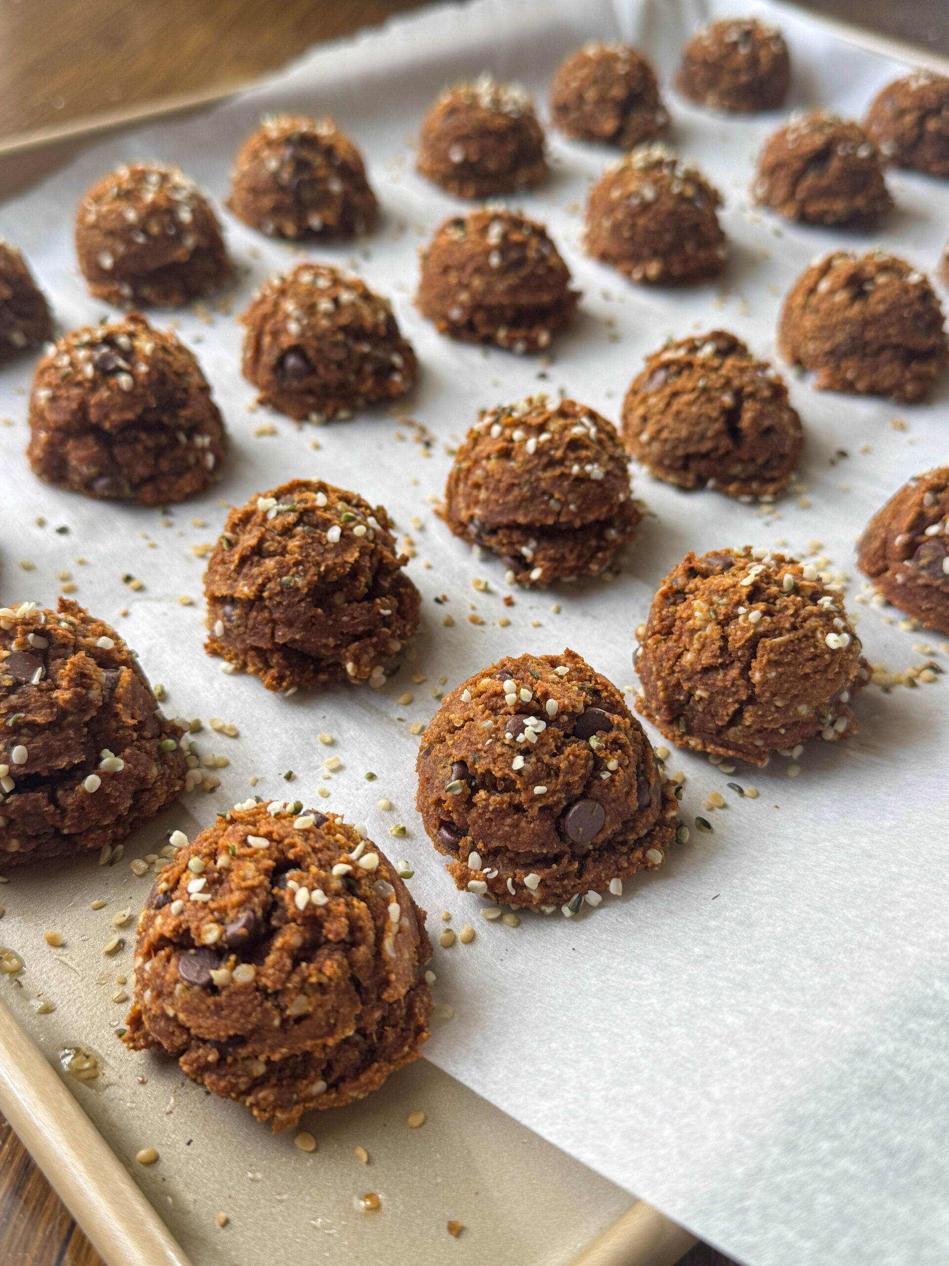 chocolate chip pumpkin cake bites on baking sheet