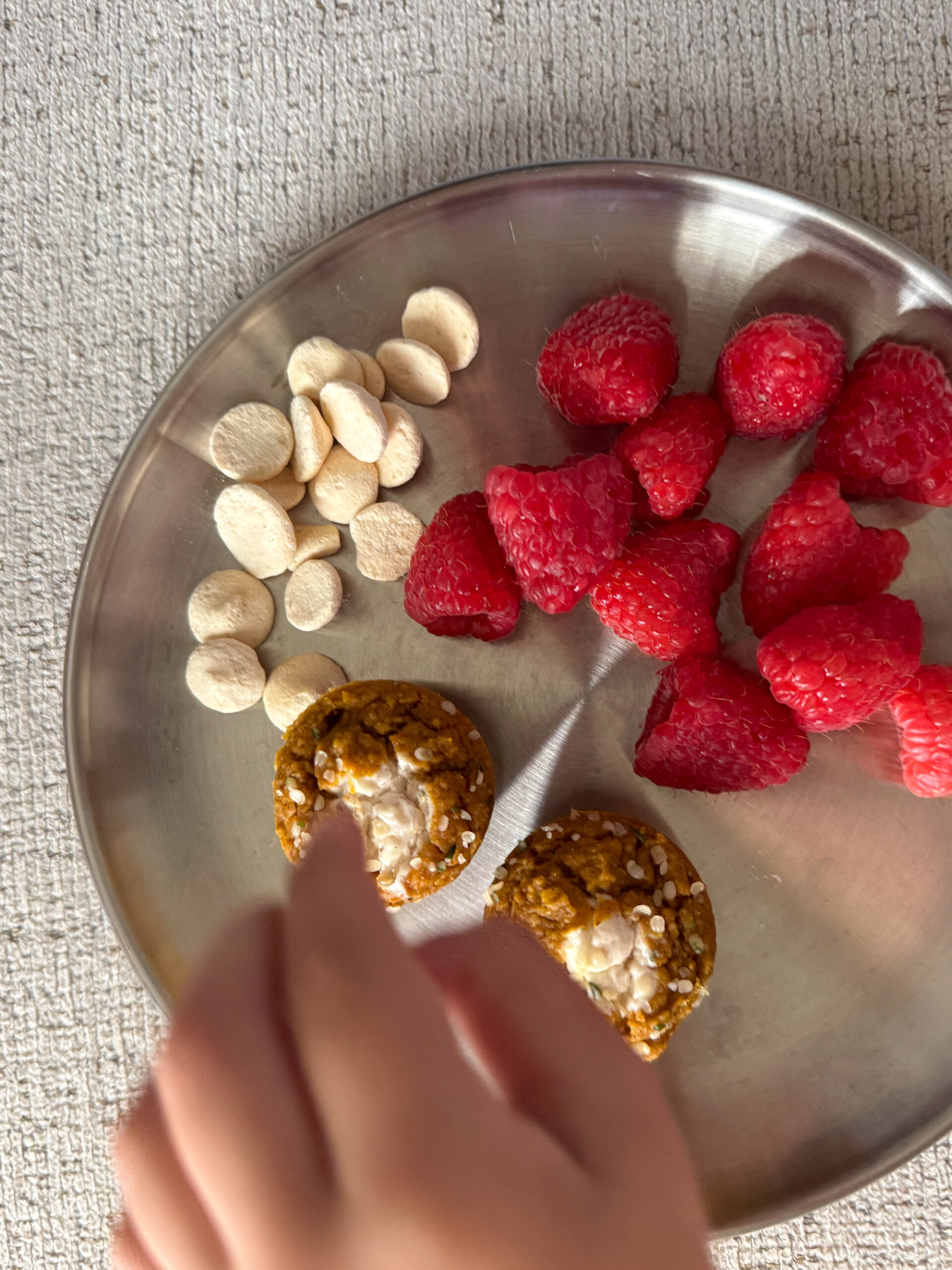 pumpkin cream cheese chickpea muffins on snack plate for toddler