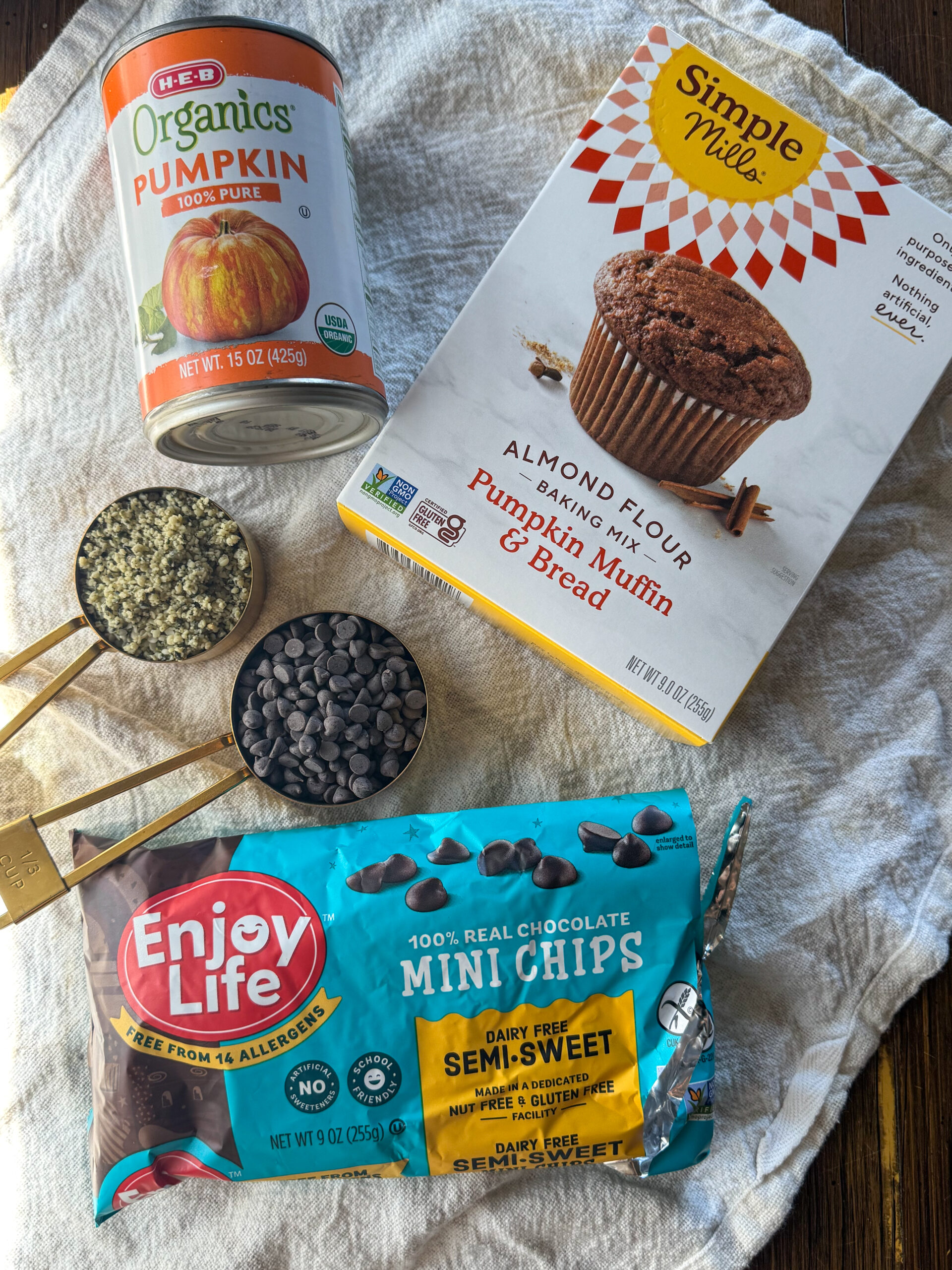 ingredients for easy 4-ingredient chocolate chip pumpkin cake pops made with pumpkin, spice cake mix, hemp hearts & chocolate chips