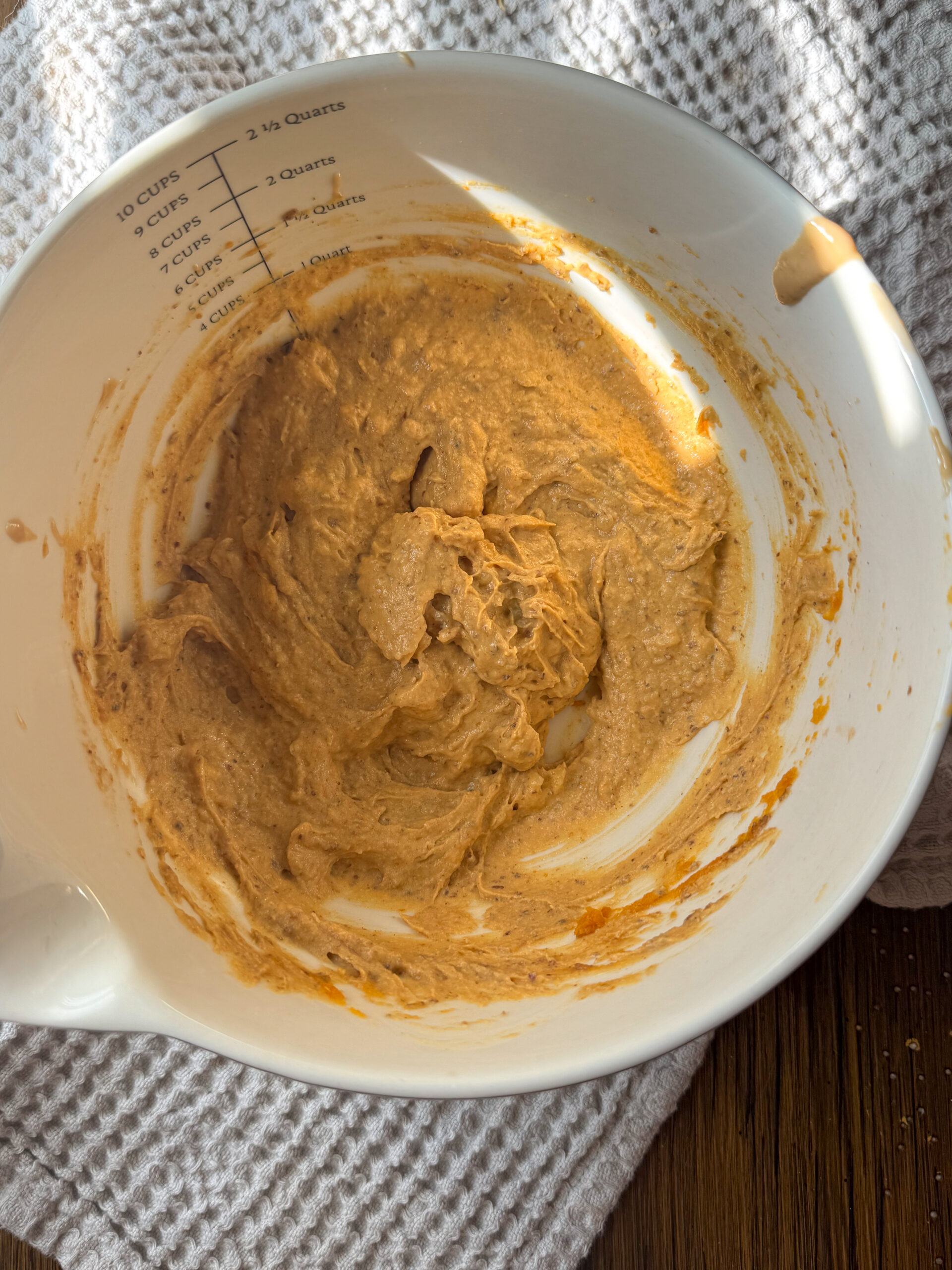 mixing pumpkin cookie ingredients together