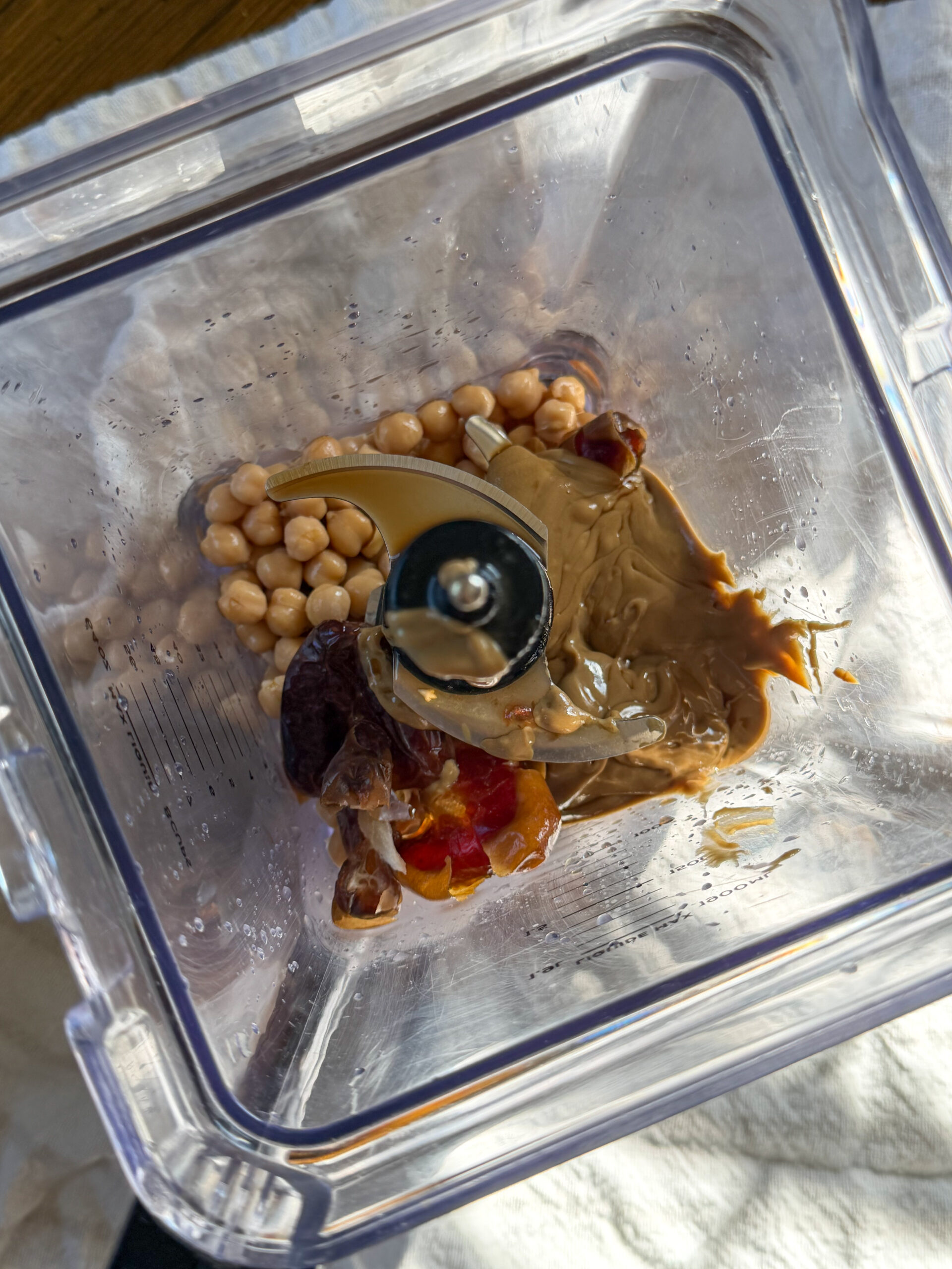 adding ingredients into the blender