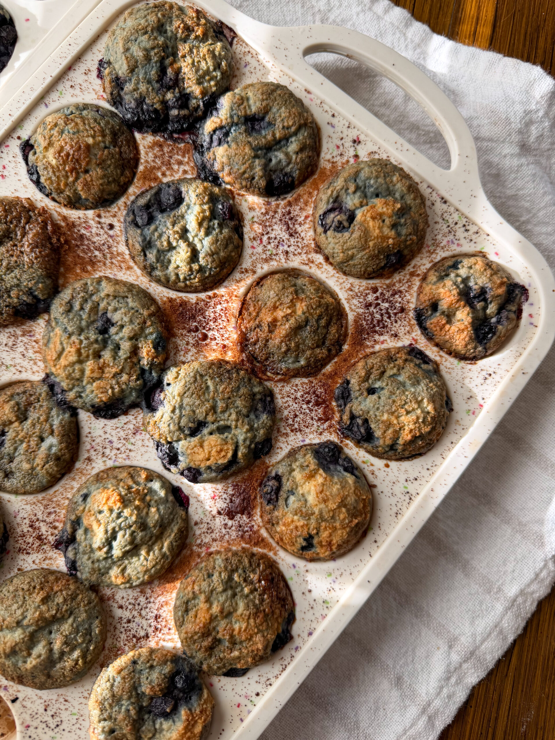 Blueberry Muffins with Greek Yogurt (low sugar & kid-friendly) in a muffin tin