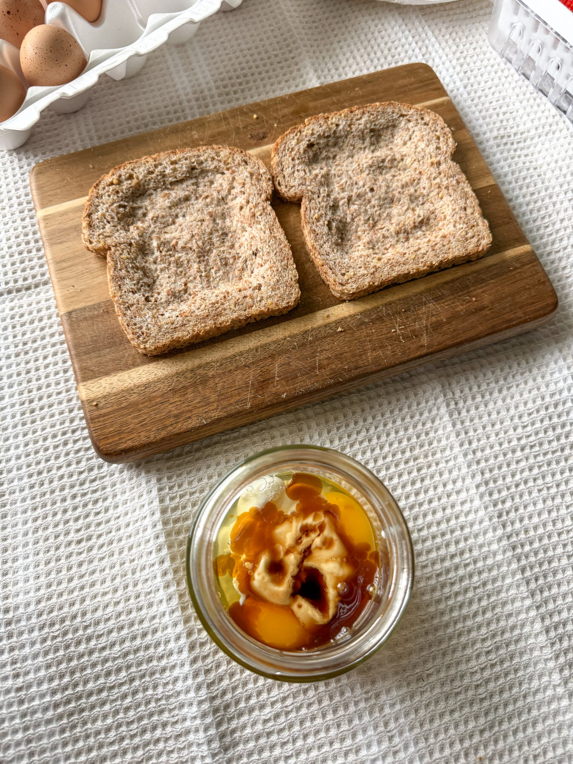 whisking the egg and yogurt together for the custard filling