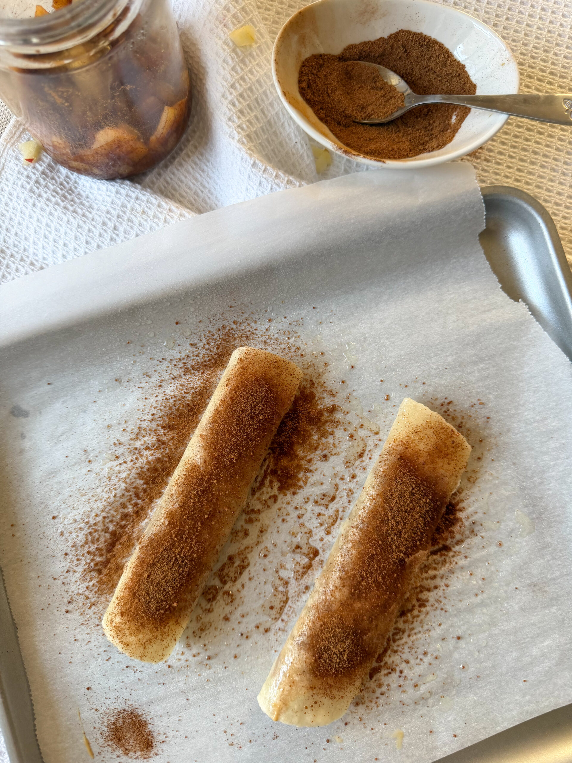 rolling the tortillas up to cook
