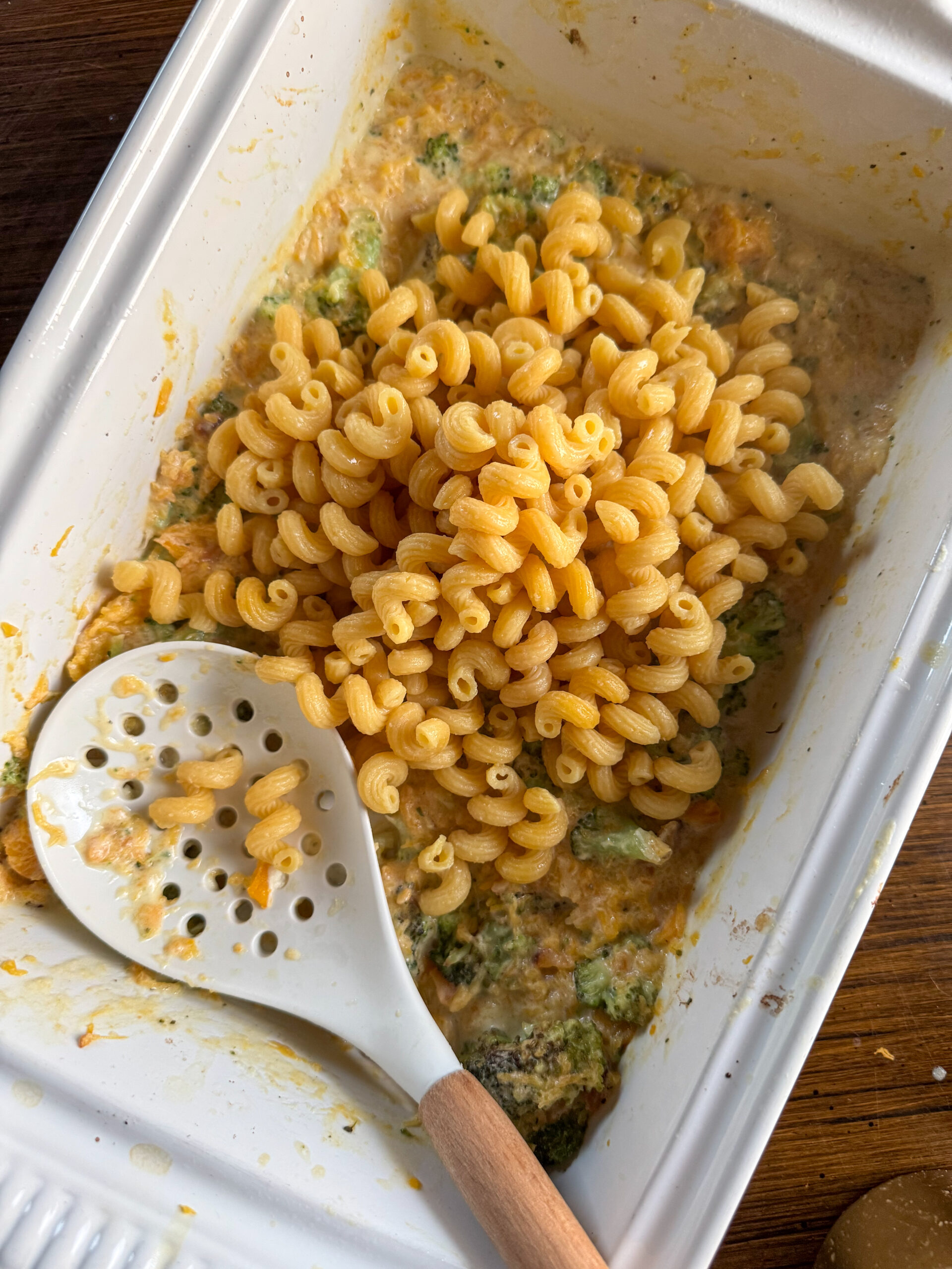 adding the noodles into the butternut squash boursin sauce