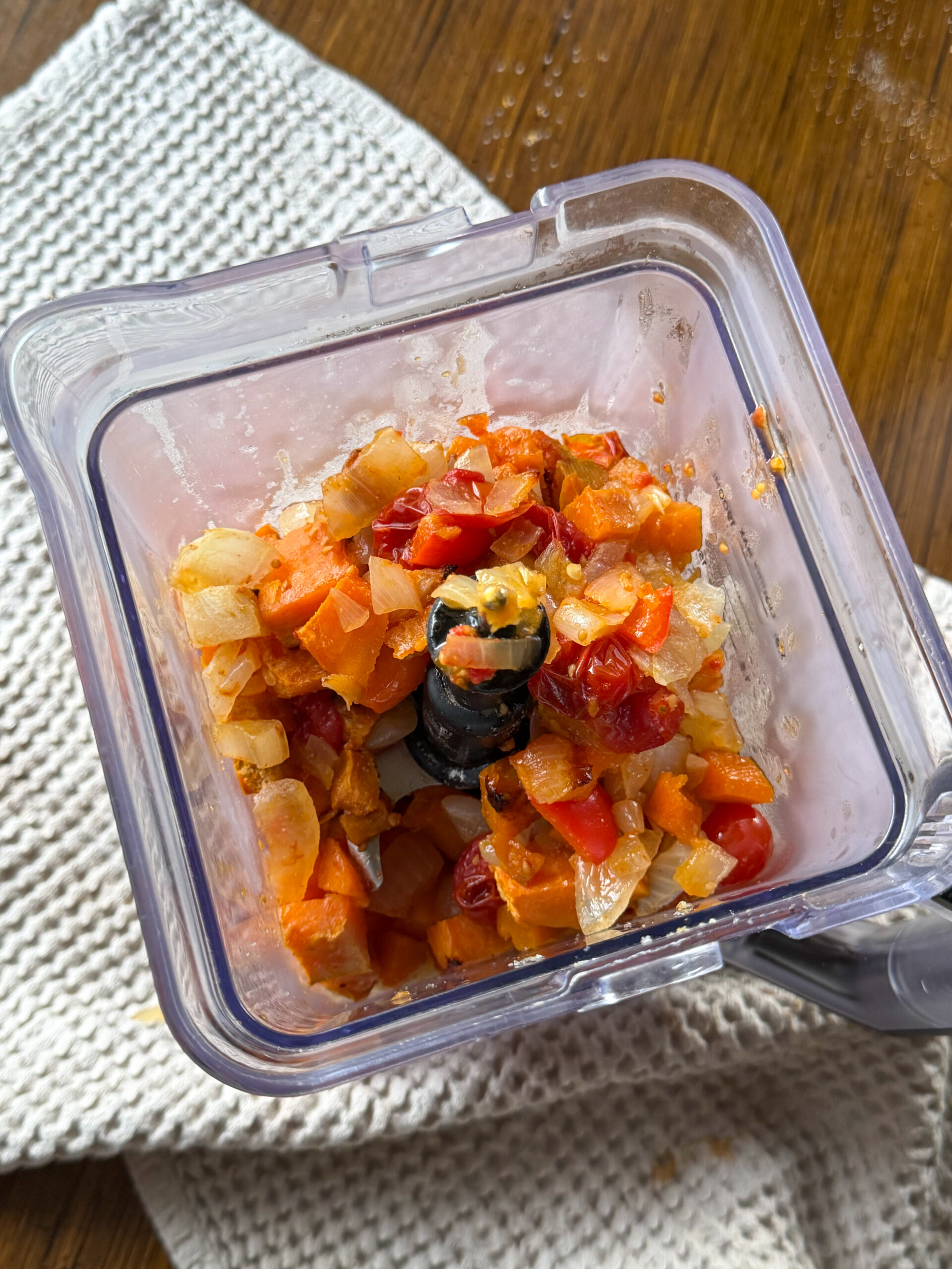 blending the vegetables for the roasted veggie pasta sauce