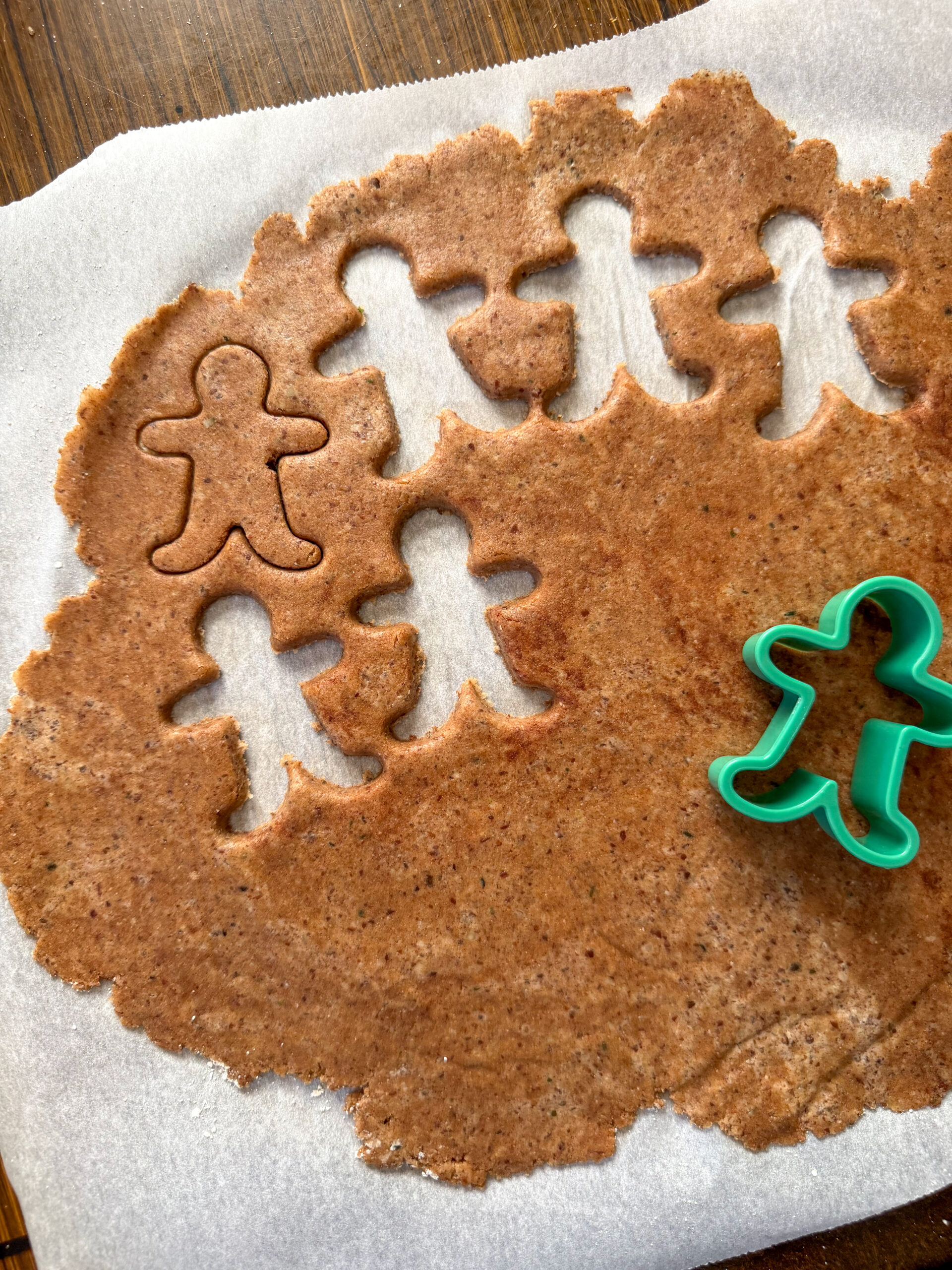 cutting out gingerbread cookies