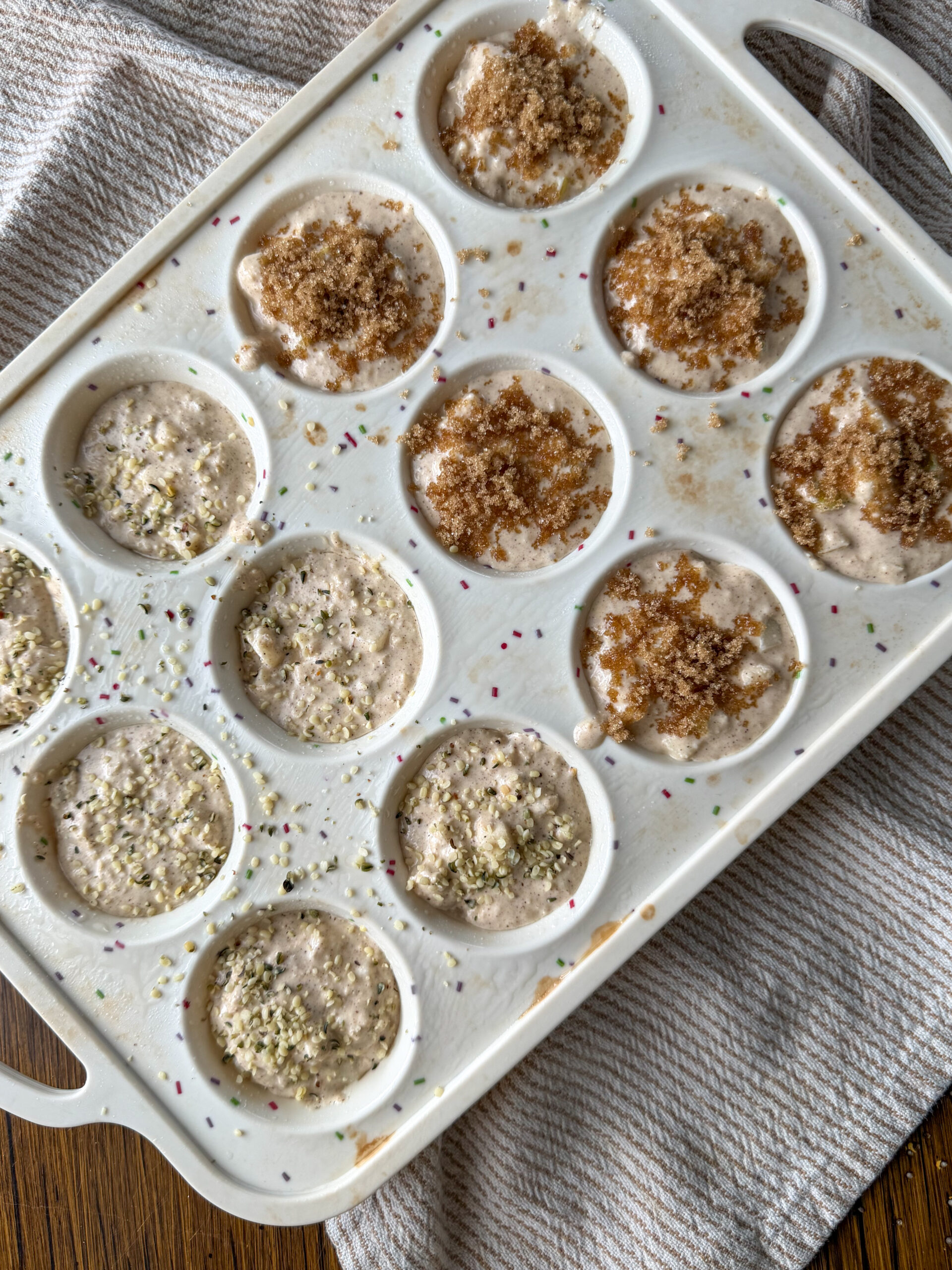 Pear Oat Greek Yogurt Muffins in the muffin pan (soft & naturally gluten free)