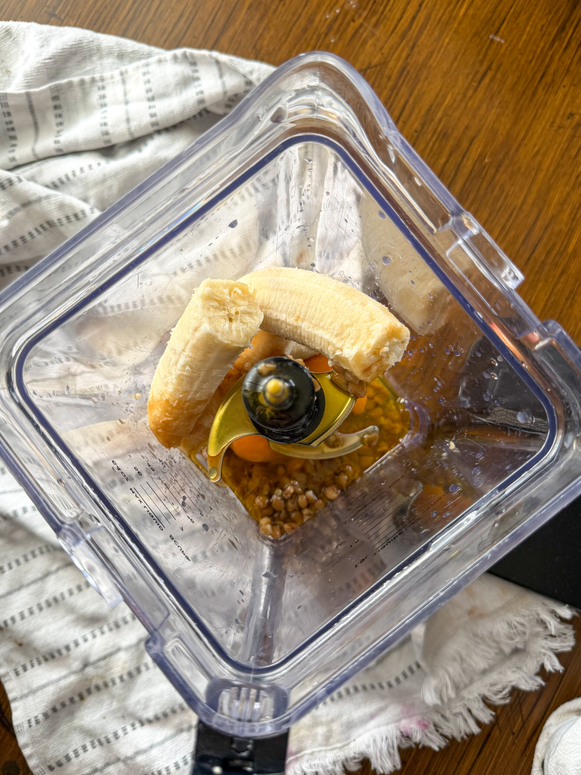 adding ingredients into the blender