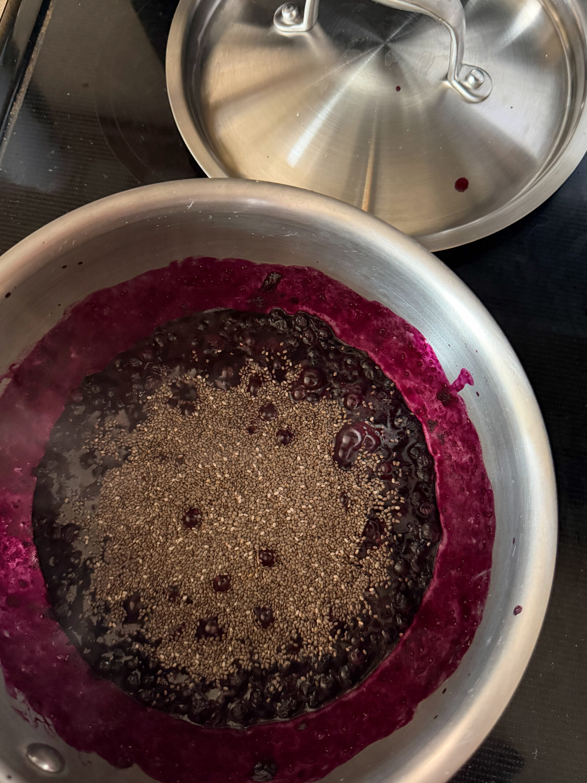 mixing chia seeds with blueberries