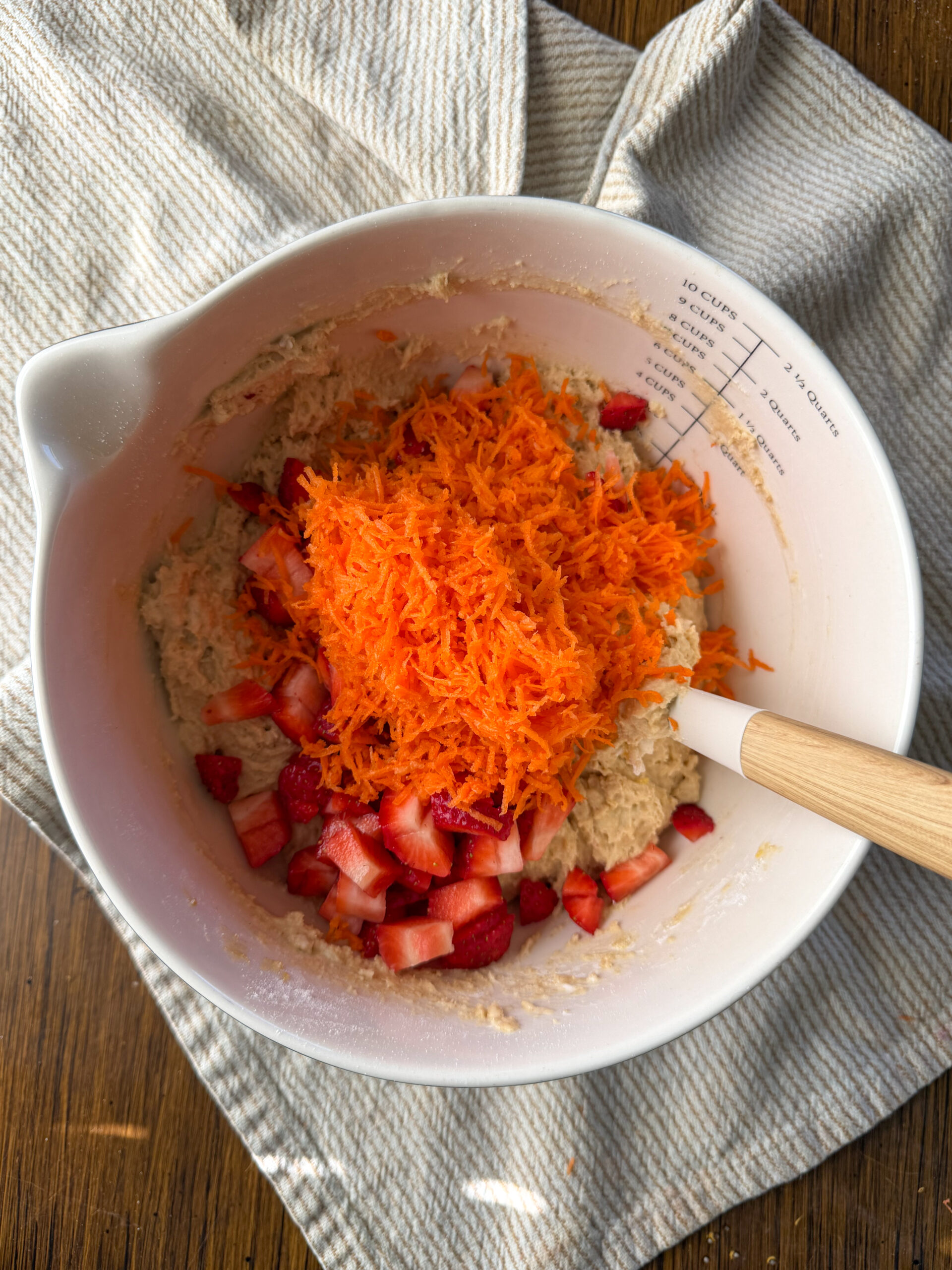 mixing ingredients in the bowl for Easy Strawberry Carrot Muffins (one-bowl, toddler-friendly)