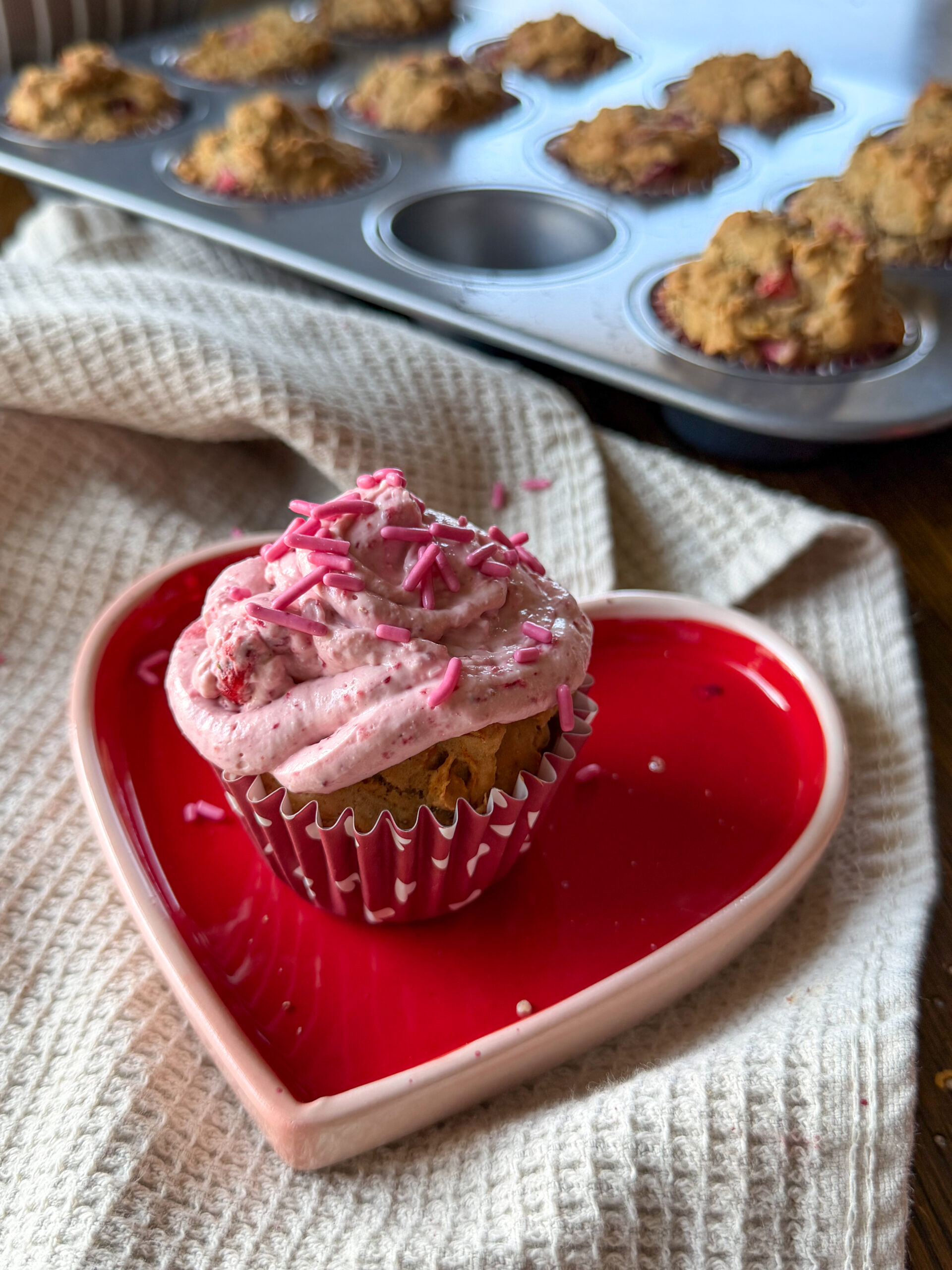 Strawberry Cream Cheese Icing on strawberry cupcakes (so simple, only 5 ingredients!)
