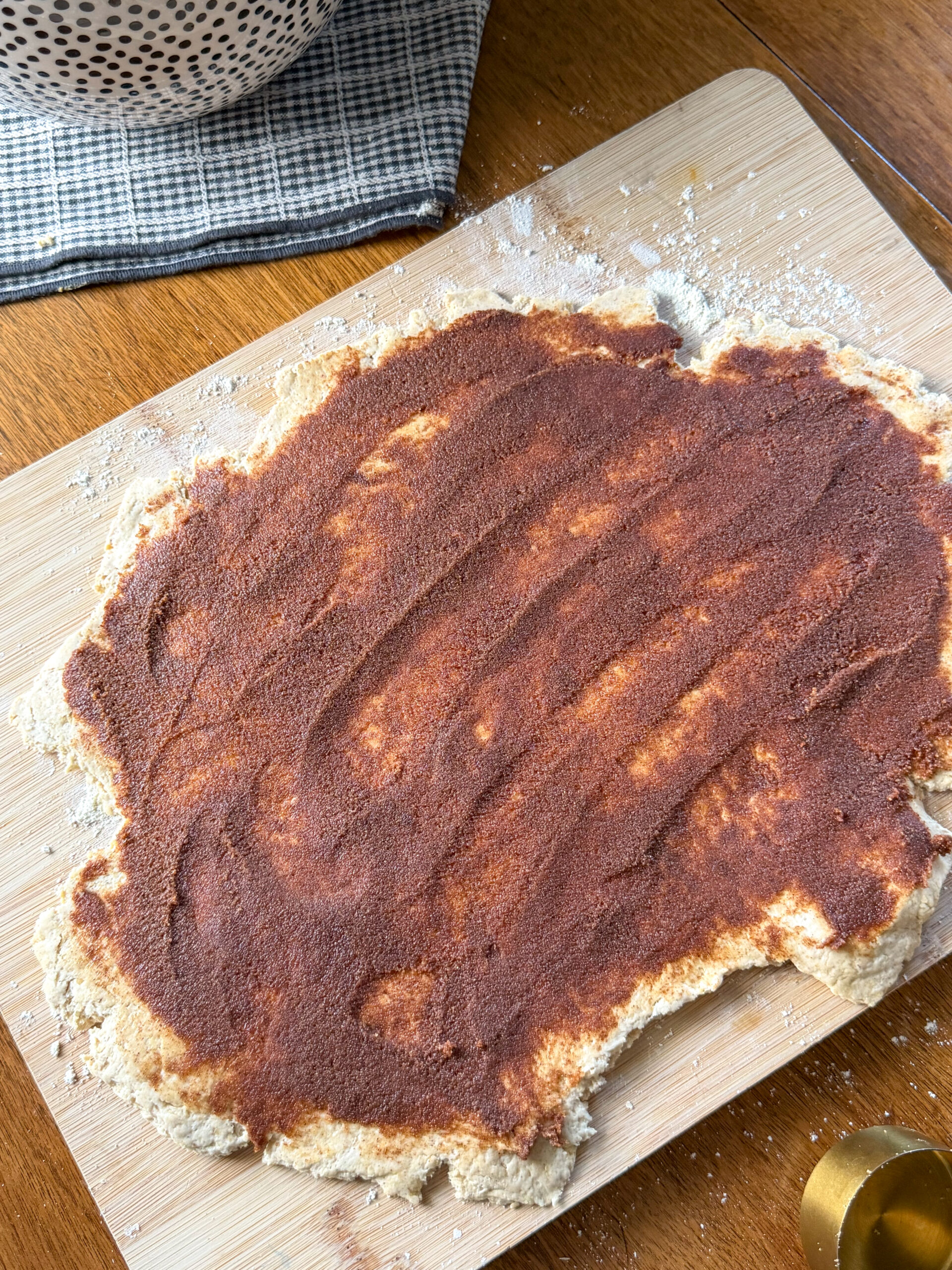 rolling out cinnamon rolls