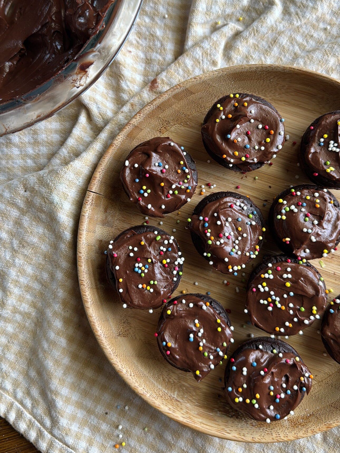 chocolate avocado frosting spread on black bean brownie bites