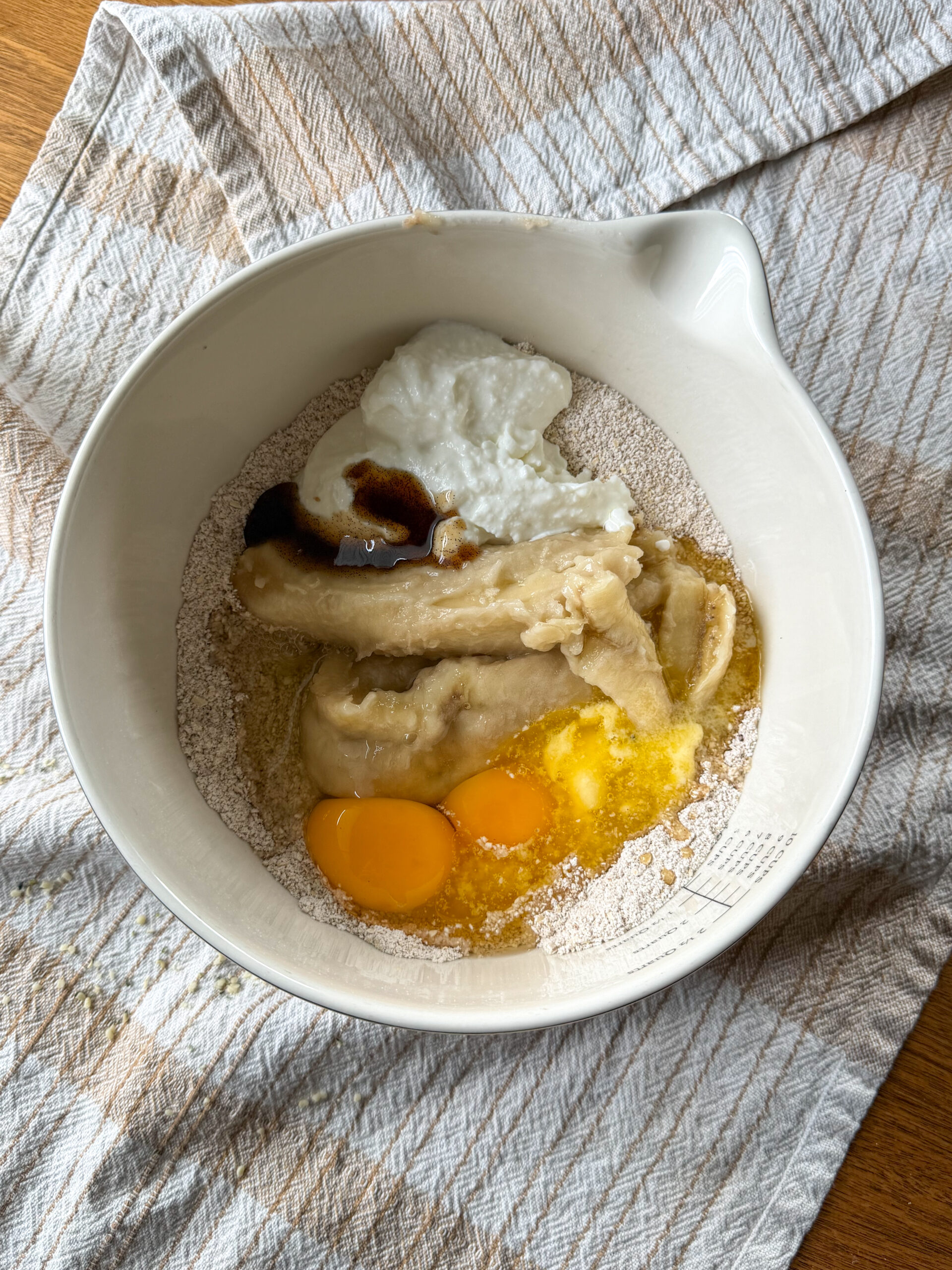 mixing the ingredients for the Soft Banana Bread Cookies for Toddlers (simple, no added sugar!) in a bowl