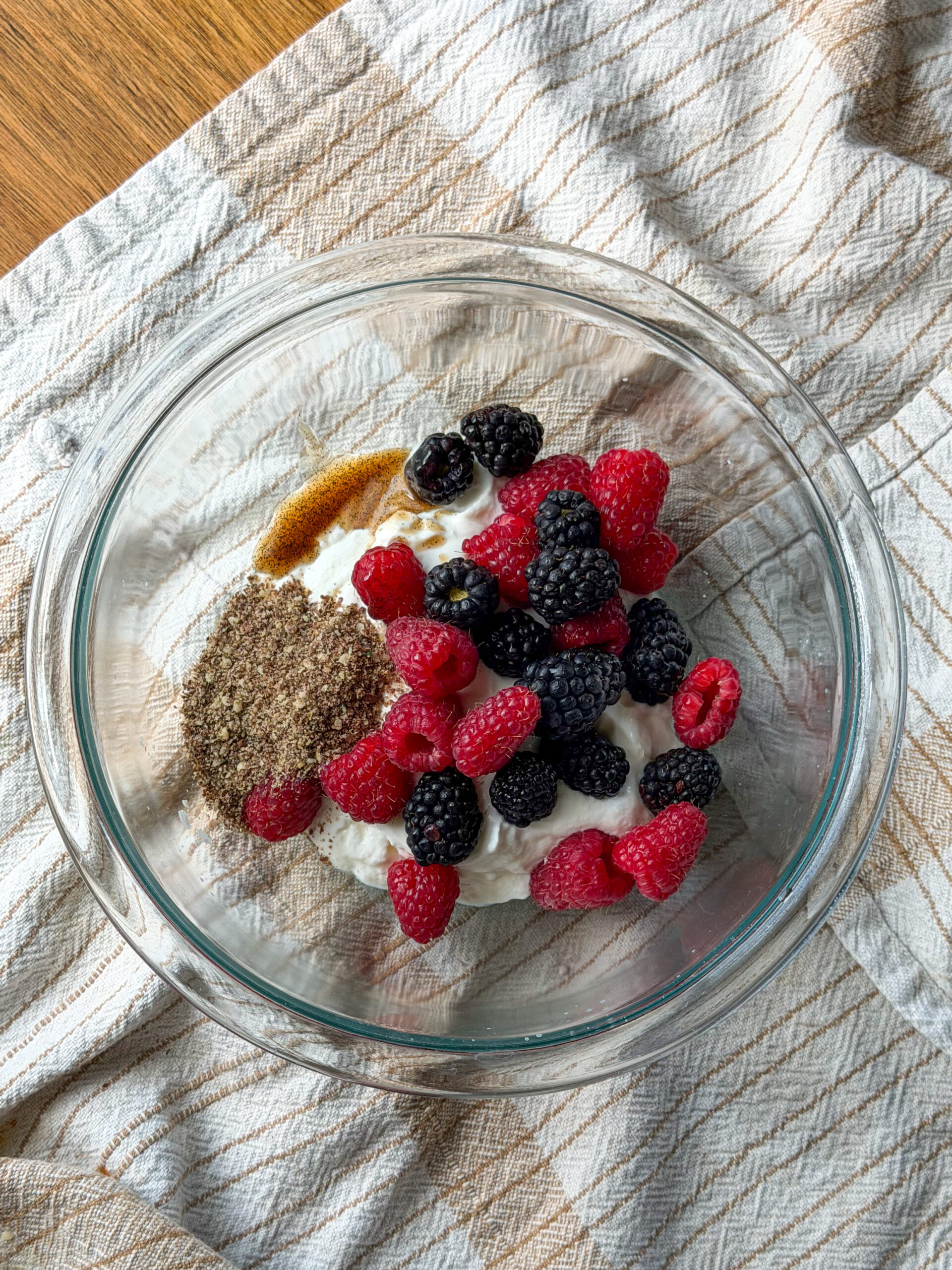 mixed berries and yogurt in a bowl