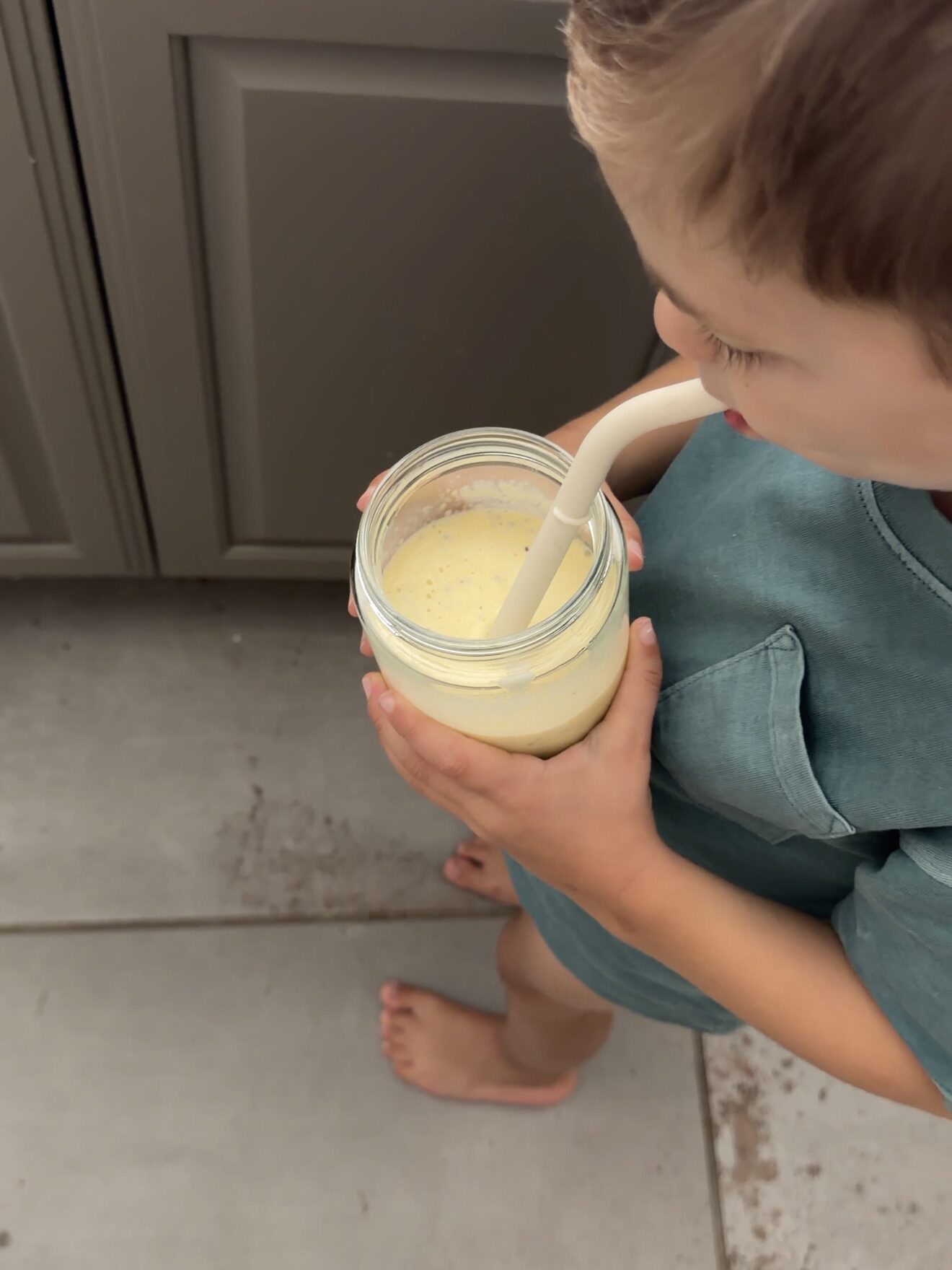 toddler drinking smoothie from toddler dietitian tiff recipes