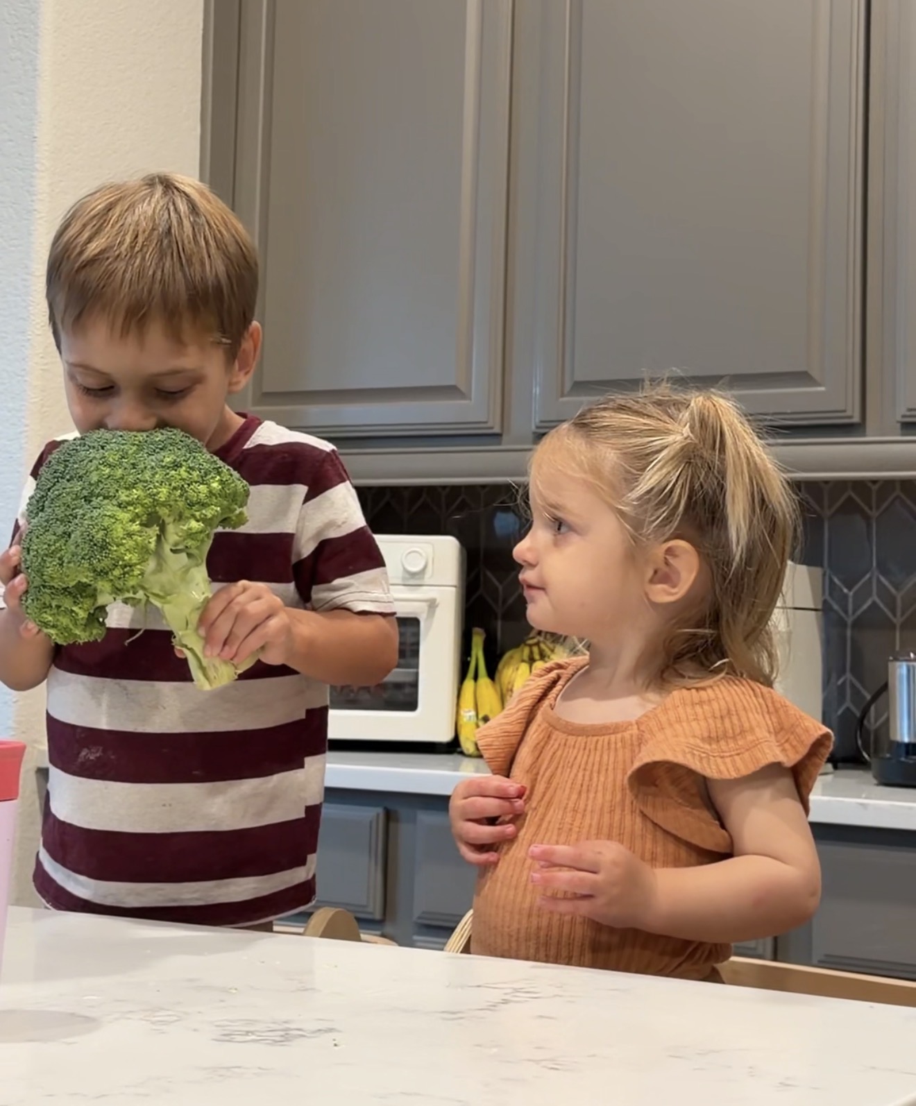 toddlers helping with Easy Beef Broth Bowl with Coconut Curry Sauce